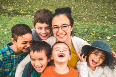 Lawyer accused of beating wife to death as she clung to infant son and two other children watched