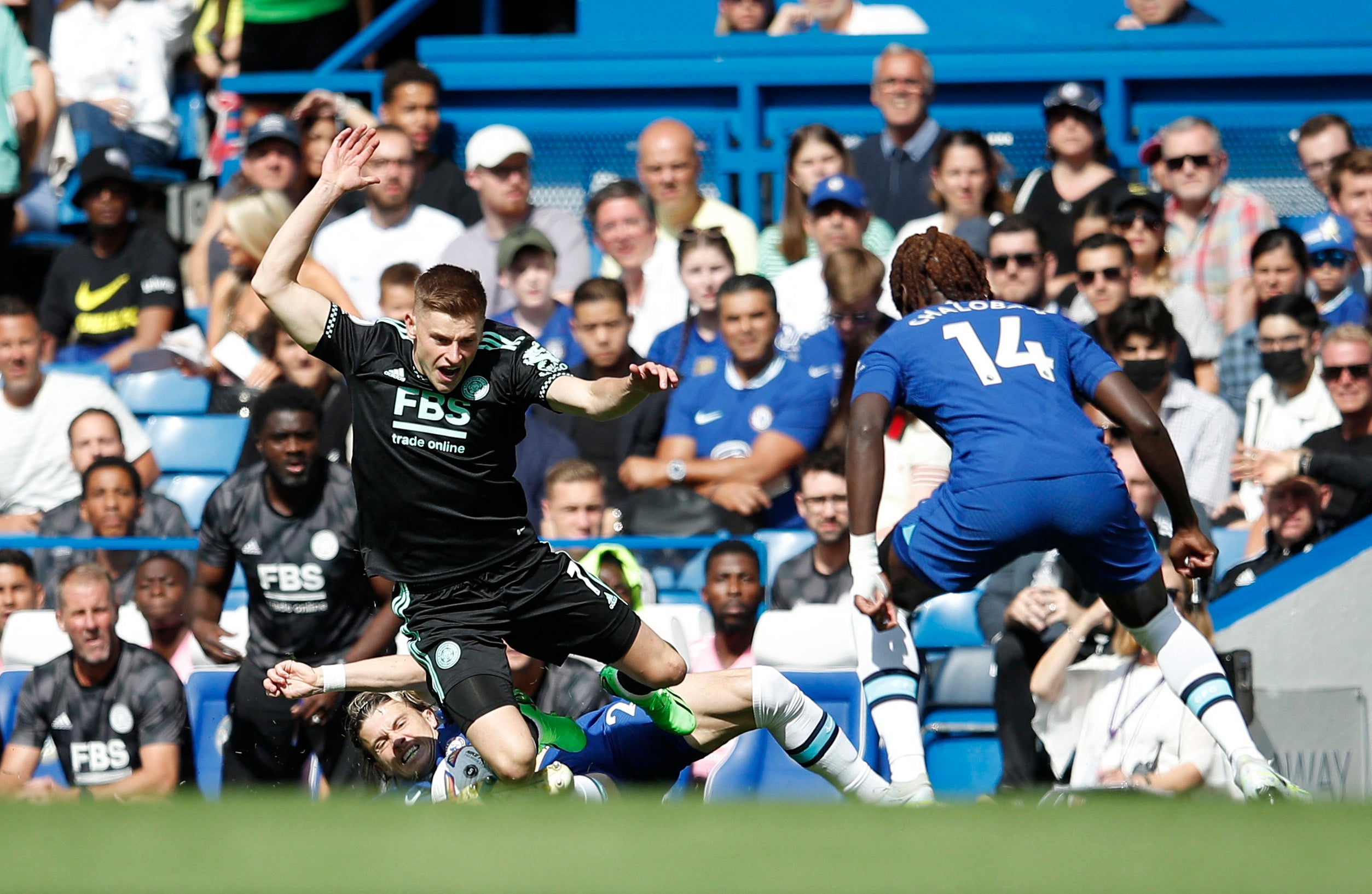 Harvey Barnes is tackled at Stamford Bridge