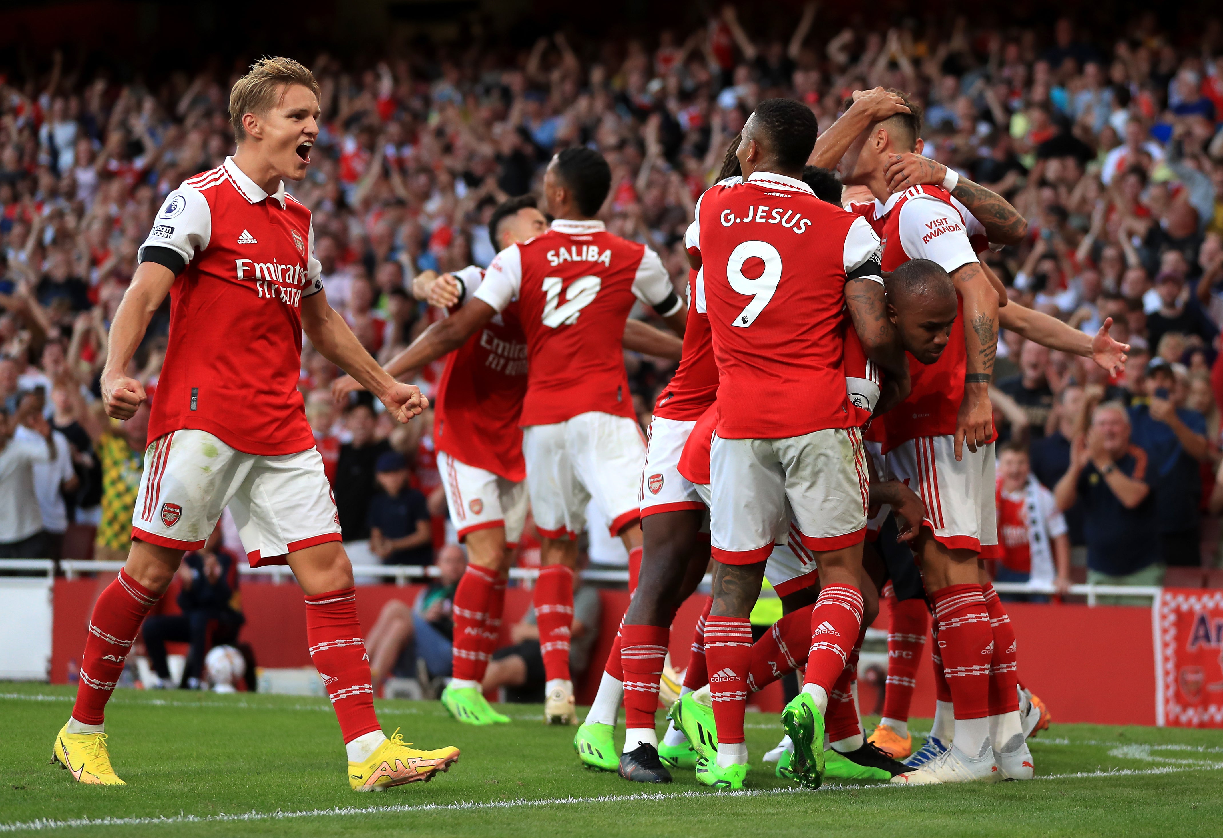 Arsenal celebrate Gabriel’s winner (Bradley Collyer/PA)