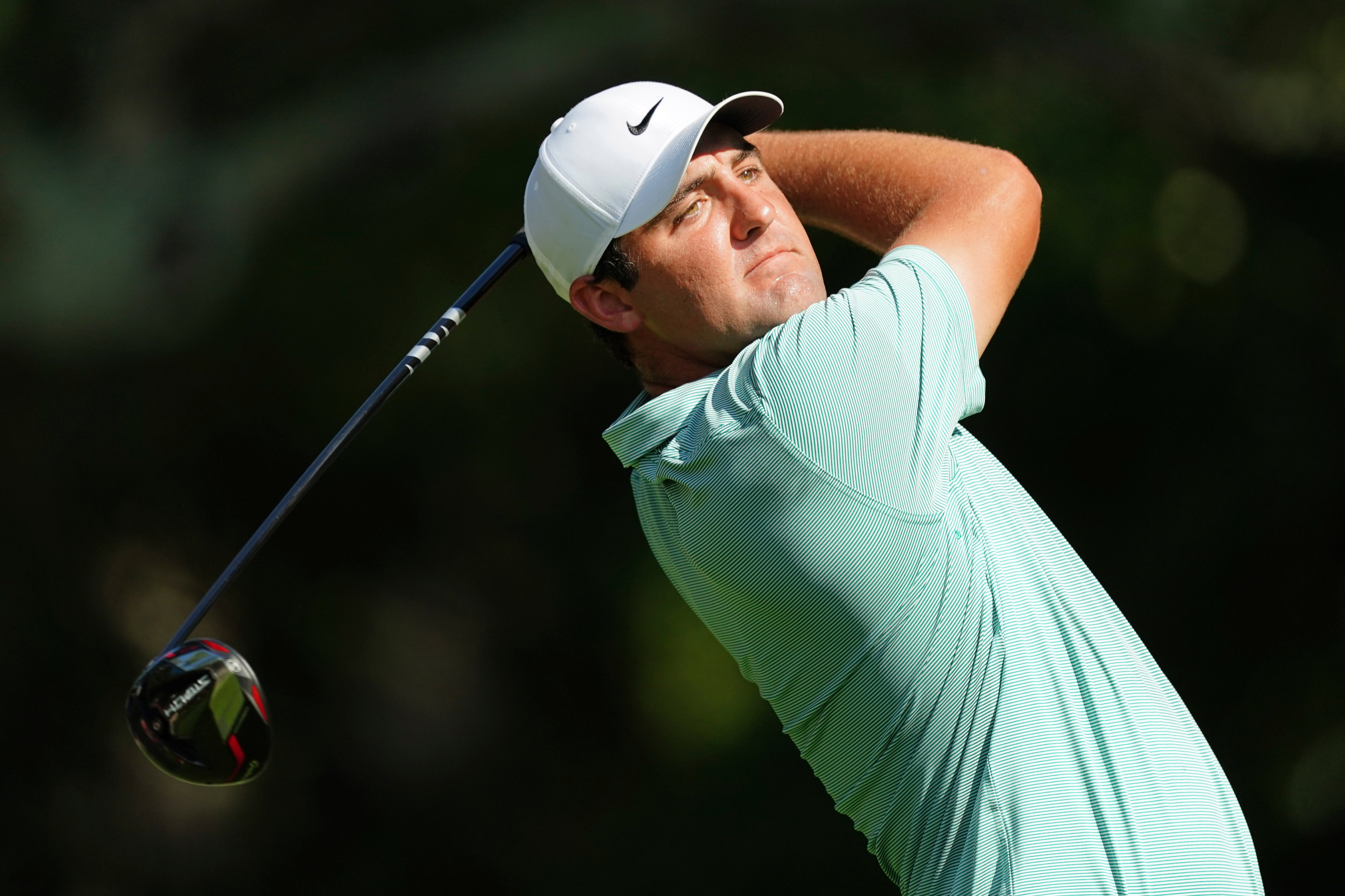 Scottie Scheffler was just in front at the Tour Championship as storms rolled into Atlanta to suspend play during the third round (John Bazemore/AP)