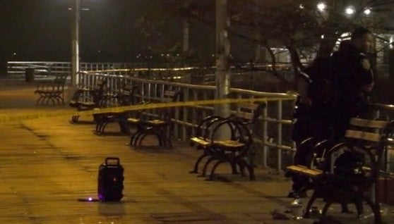 Crime scene tape on the Coney Island boardwalk after the shooting