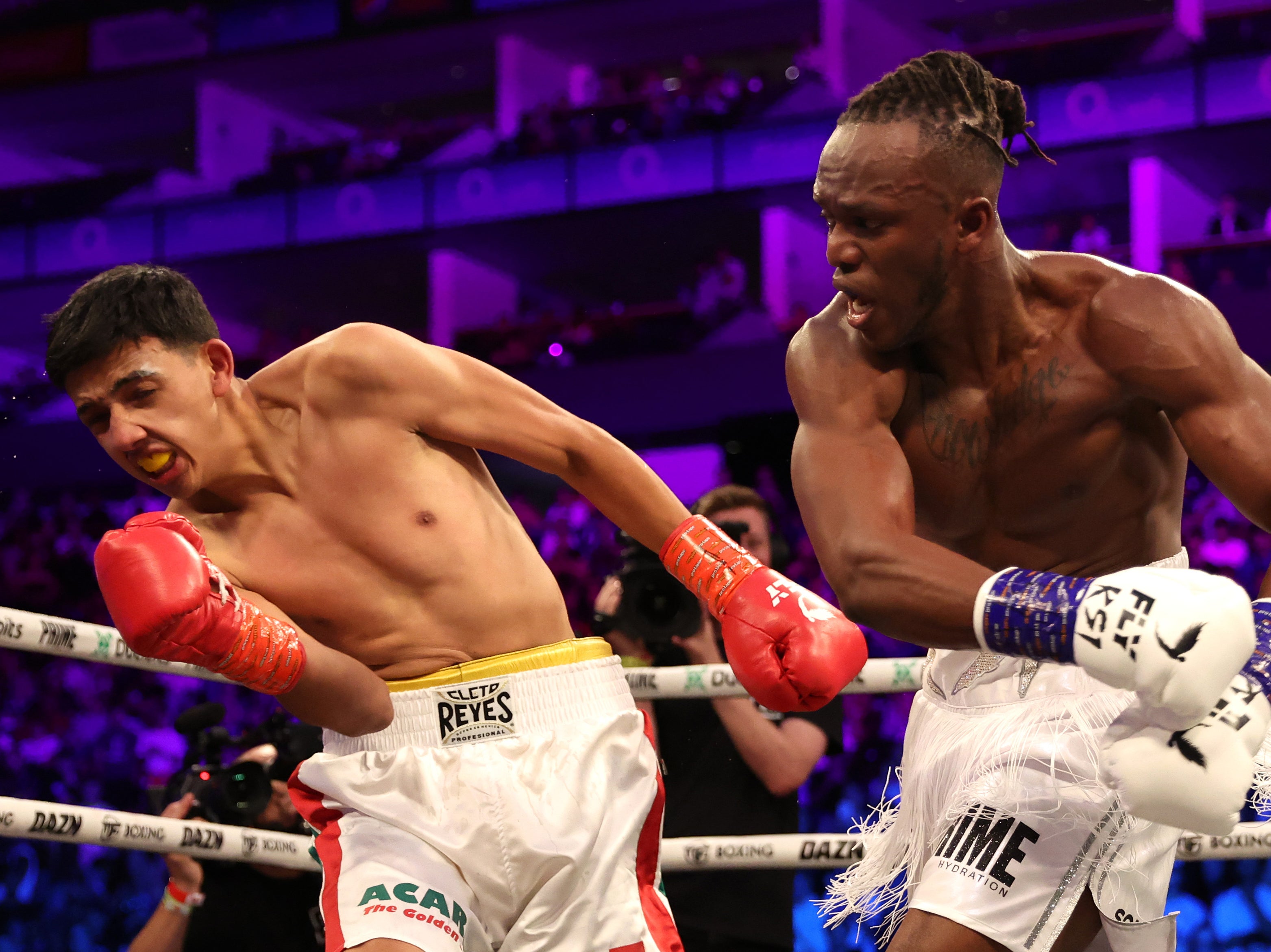 KSI (right) beat Luis Alcaraz Pineda (left) after stopping rapper Swarmz