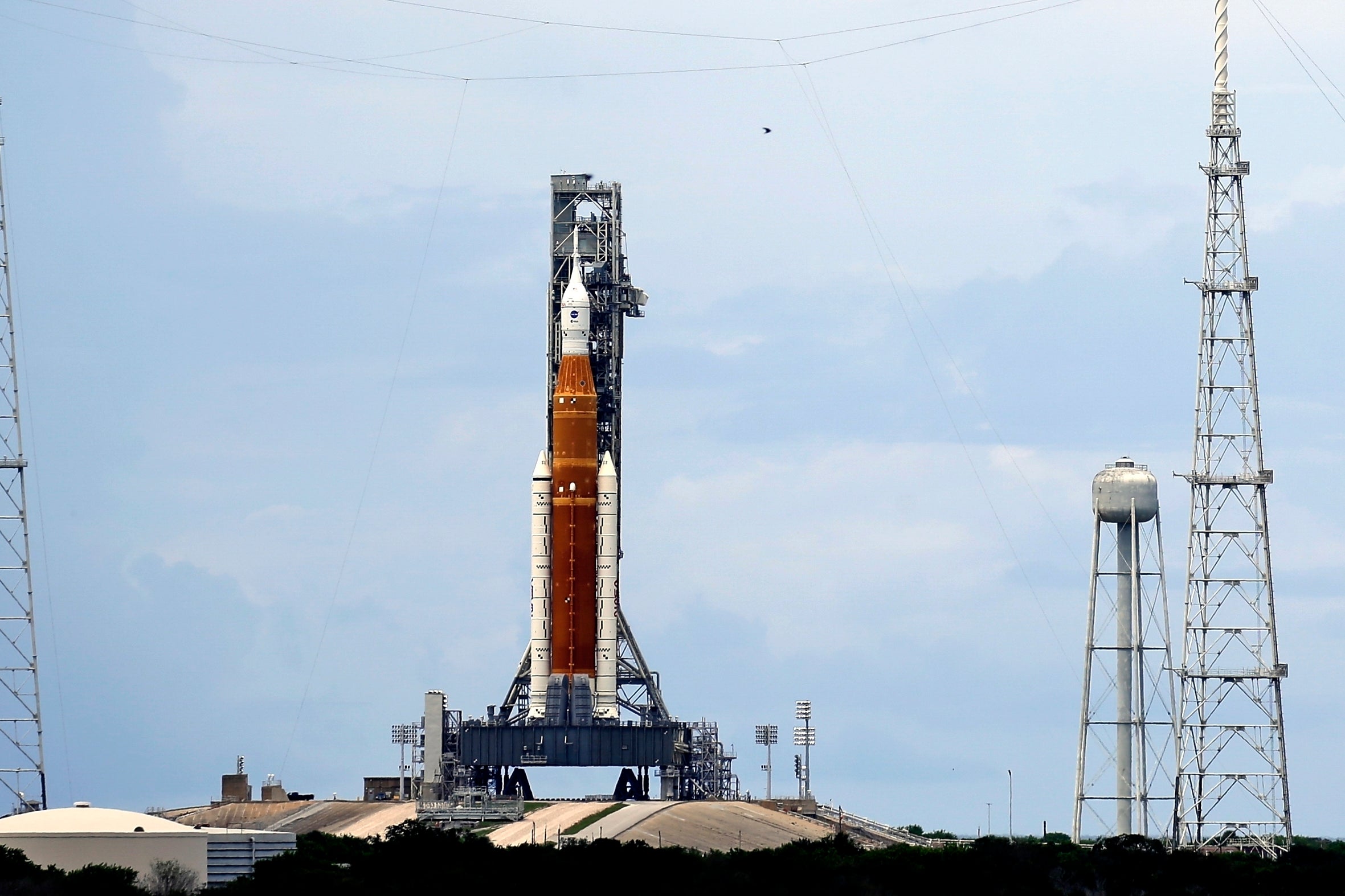 The Nasa Moon rocket stands ready for the Artemis 1 mission at the Kennedy Space Centre in Cape Canaveral, Florida (John Raoux/AP)