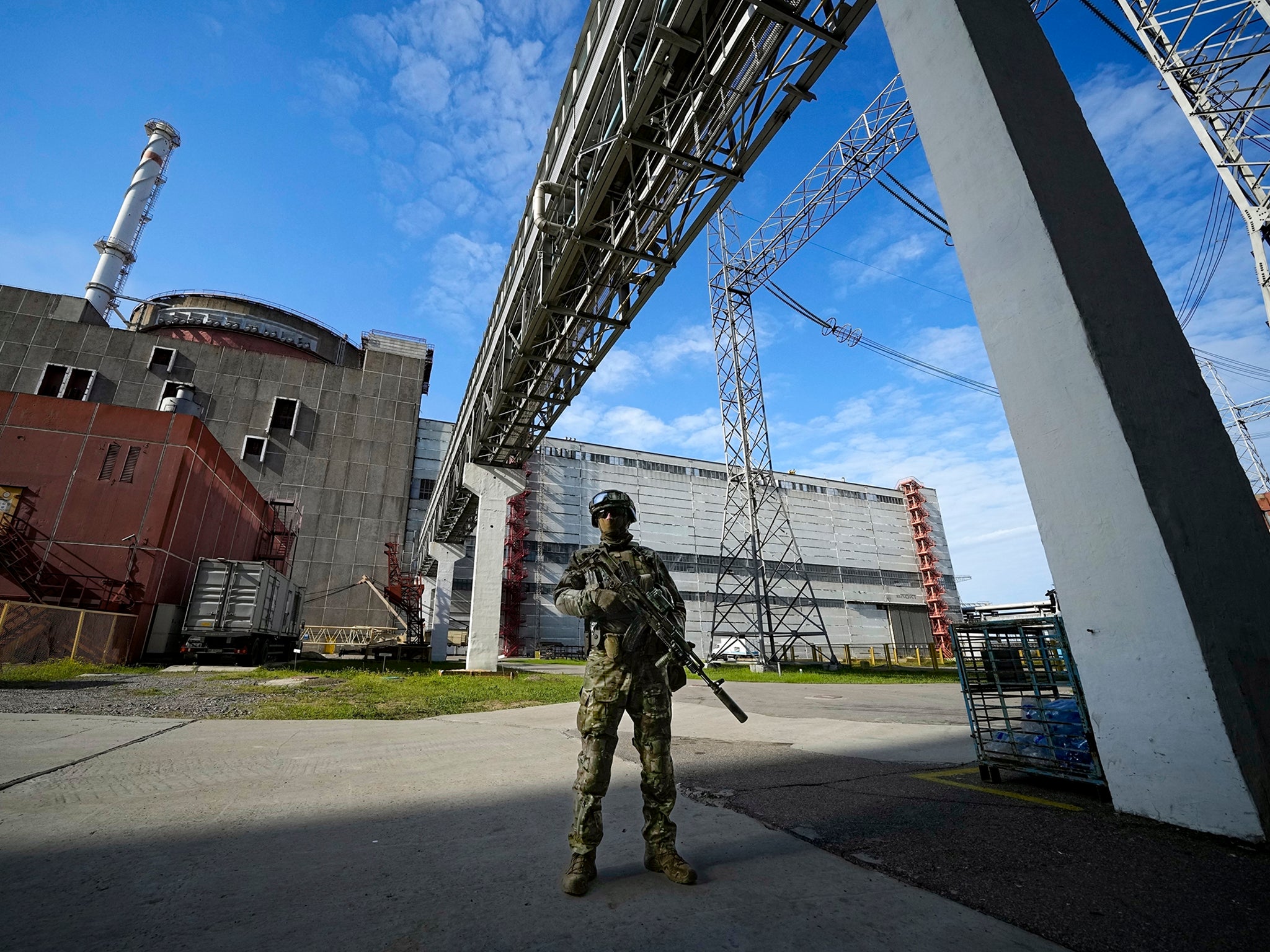 A Russian soldier stands guard at the Zaporizhzhia plant in May