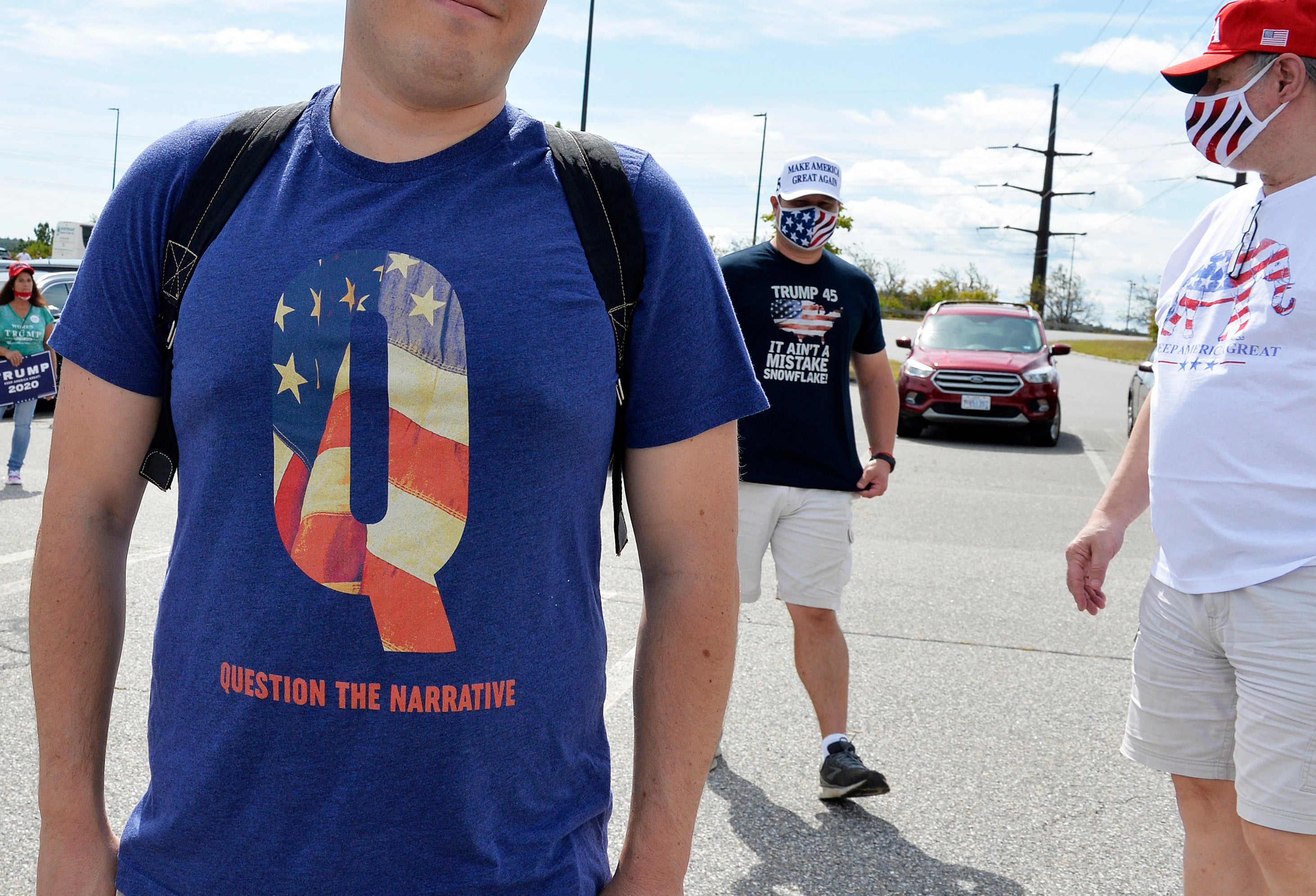 A man wears a QAnon T-shirt in New Hampshire in August 2020