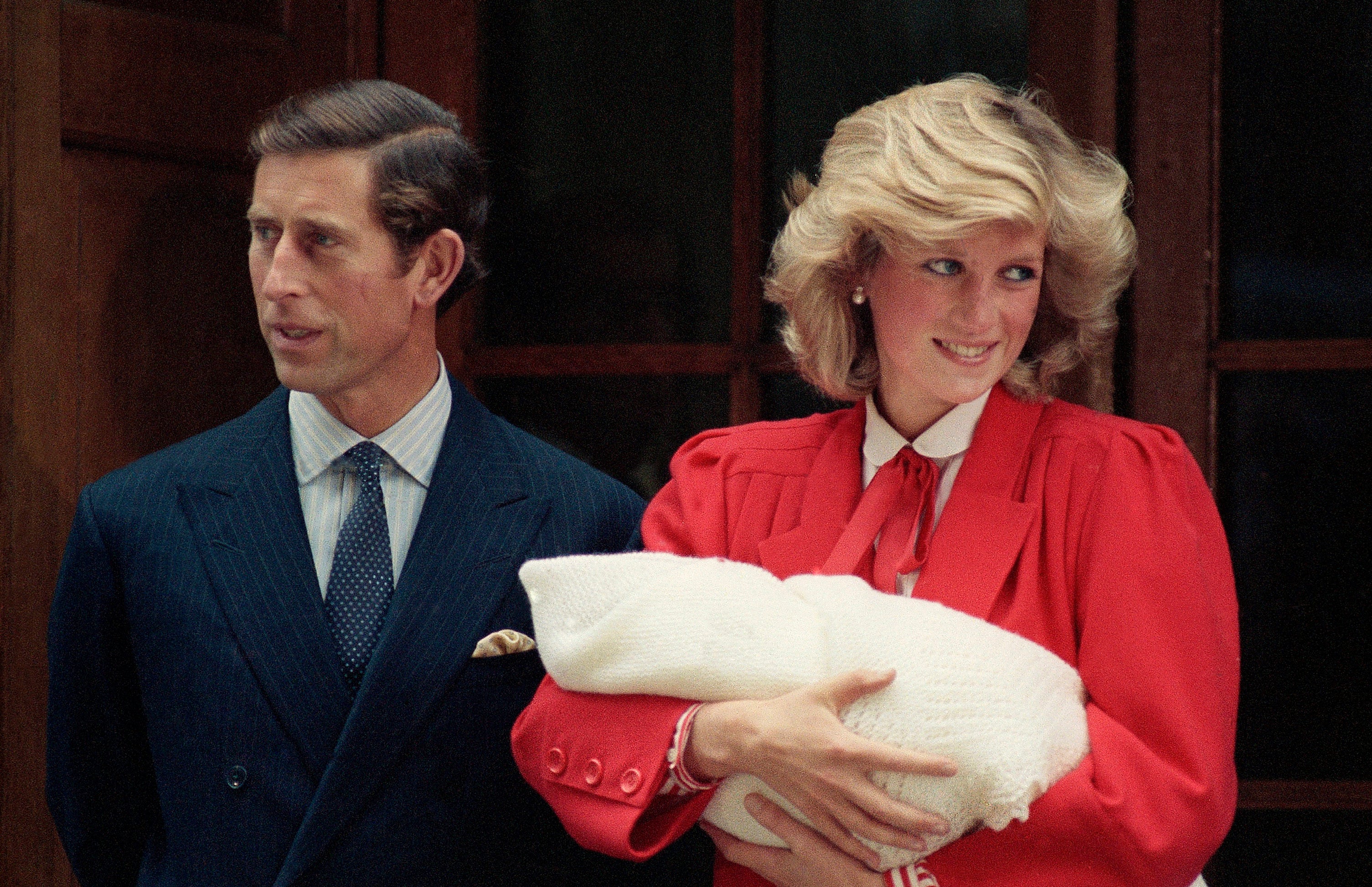 Charles, Diana and Harry after his birth in 1984