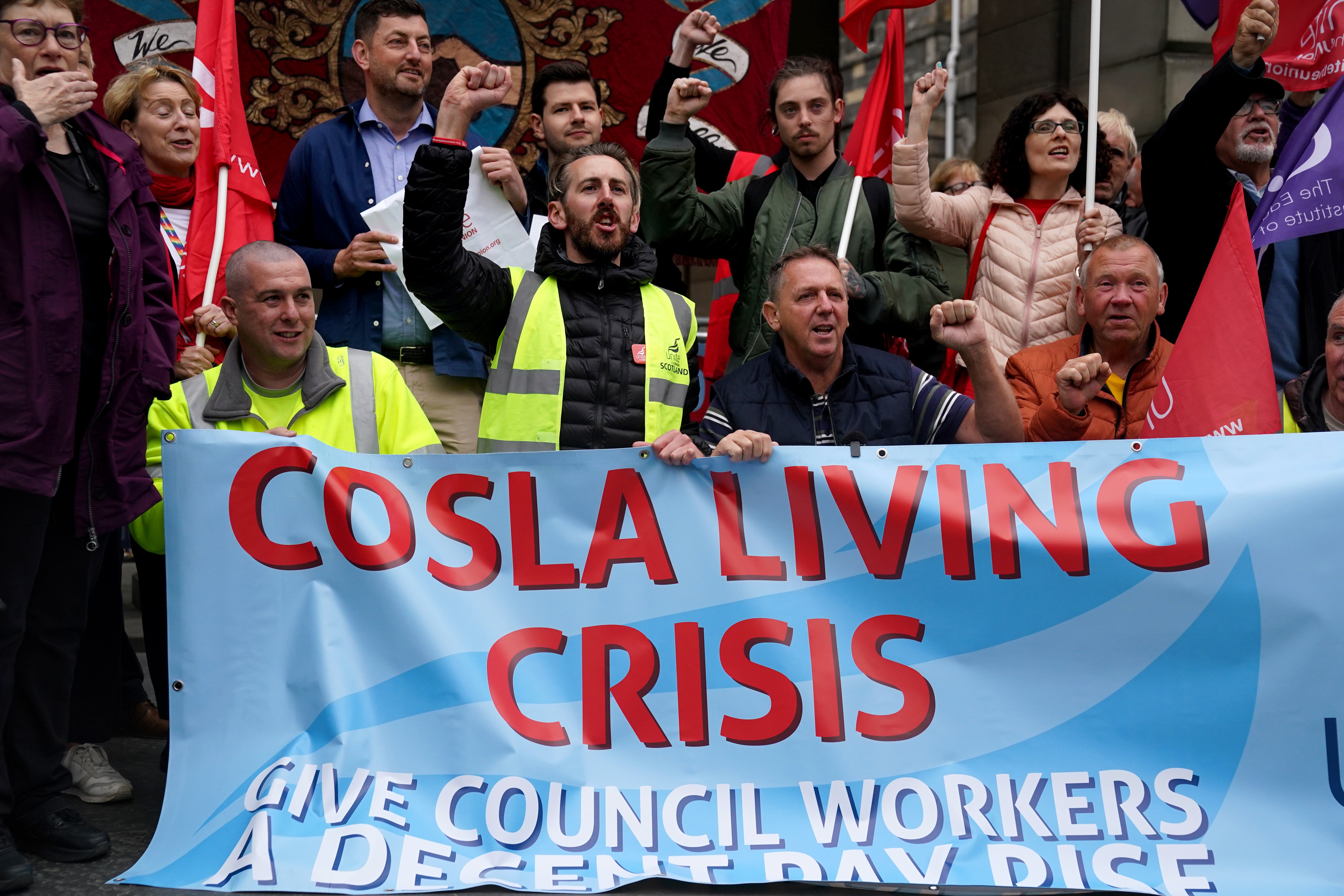 People at a rally outside Edinburgh City Council chambers as cleaning workers at the City of Edinburgh Council begin strike action