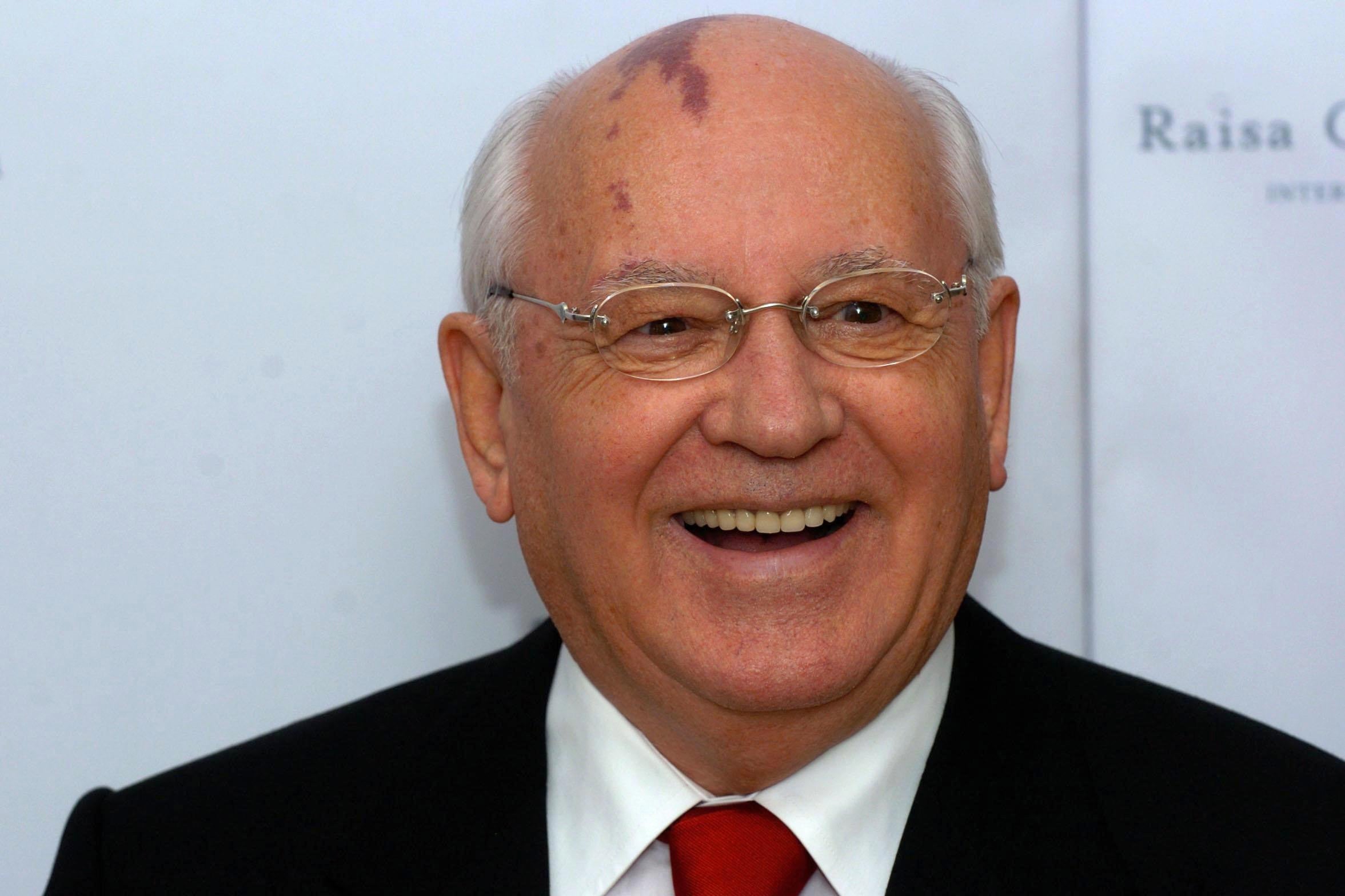 Former Russian President Mikhail Gorbachev smiles as he arrives at the Raisa Gorbachev Foundation Russian Ball held at Althorp House, Northamptonshire (Chris Radburn/PA)