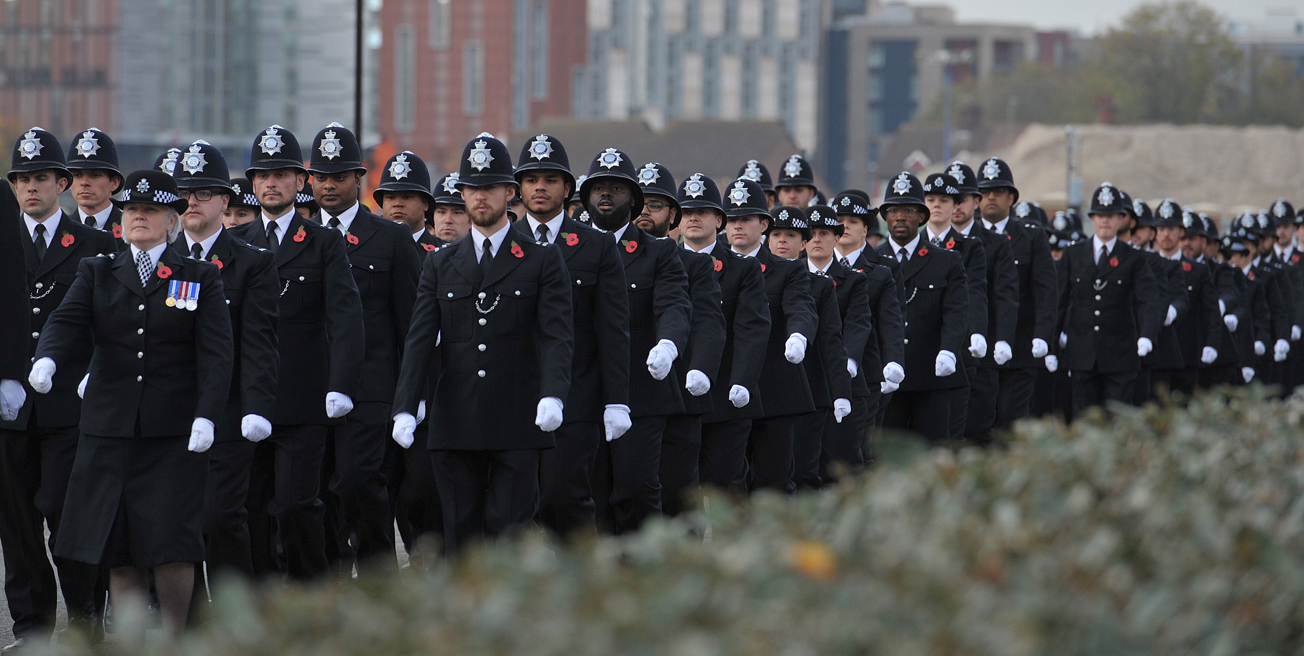 Metropolitan Police recruits marching during a passing out parade (PA)