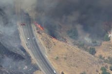 California freeway near Los Angeles shut down by wildfire as heatwave scorches state
