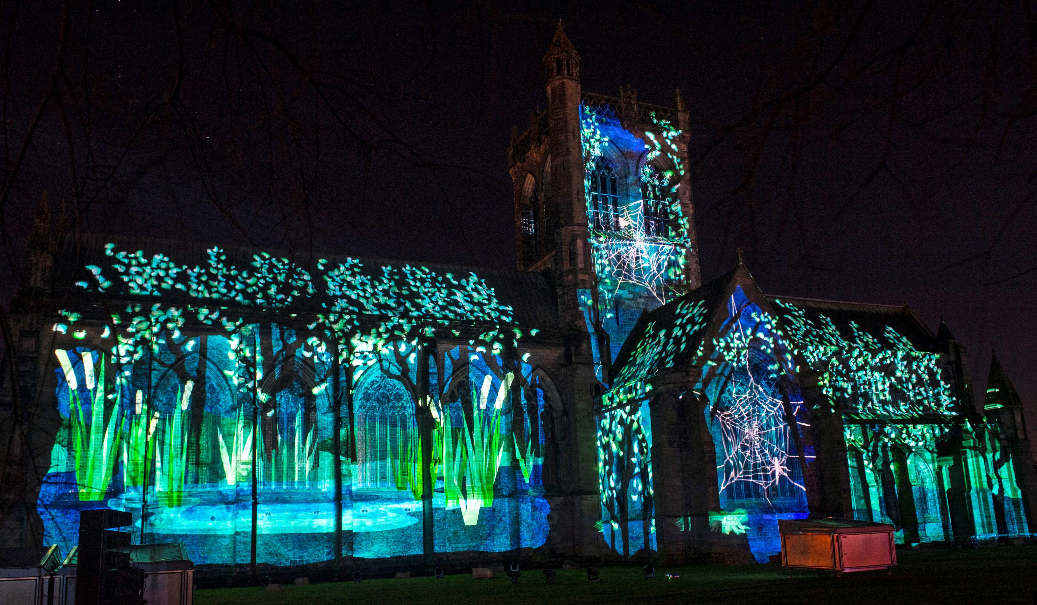 Paisley Abbey illumintated during an installation as part of Unboxed