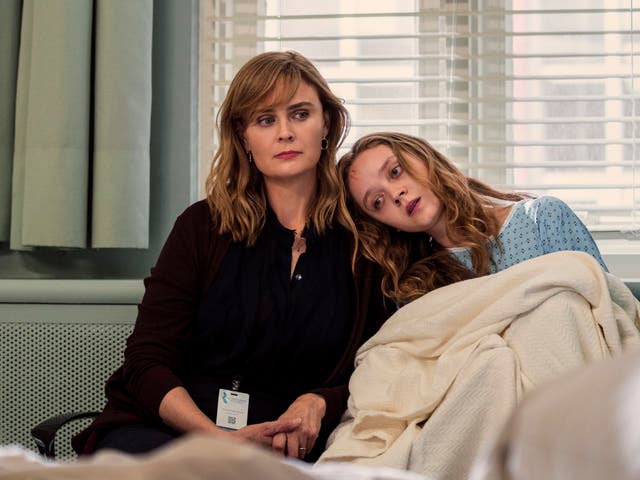 <p>Dr Suzanne Mathis (Emily Deschanel) with cult escapee Mae (Madeleine Arthur)</p>