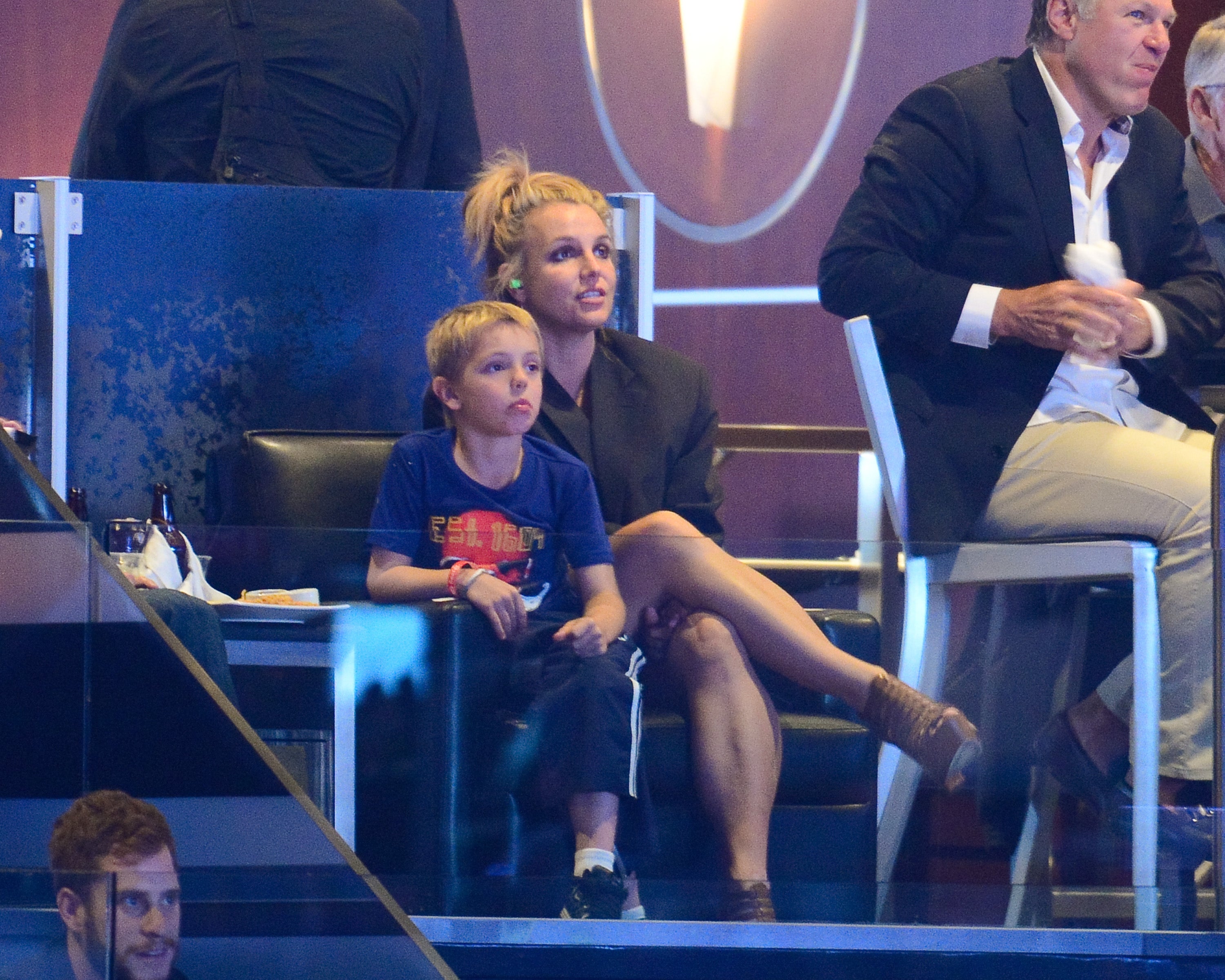 Britney Spears and her son Jayden James Federline attend a hockey game in 2014