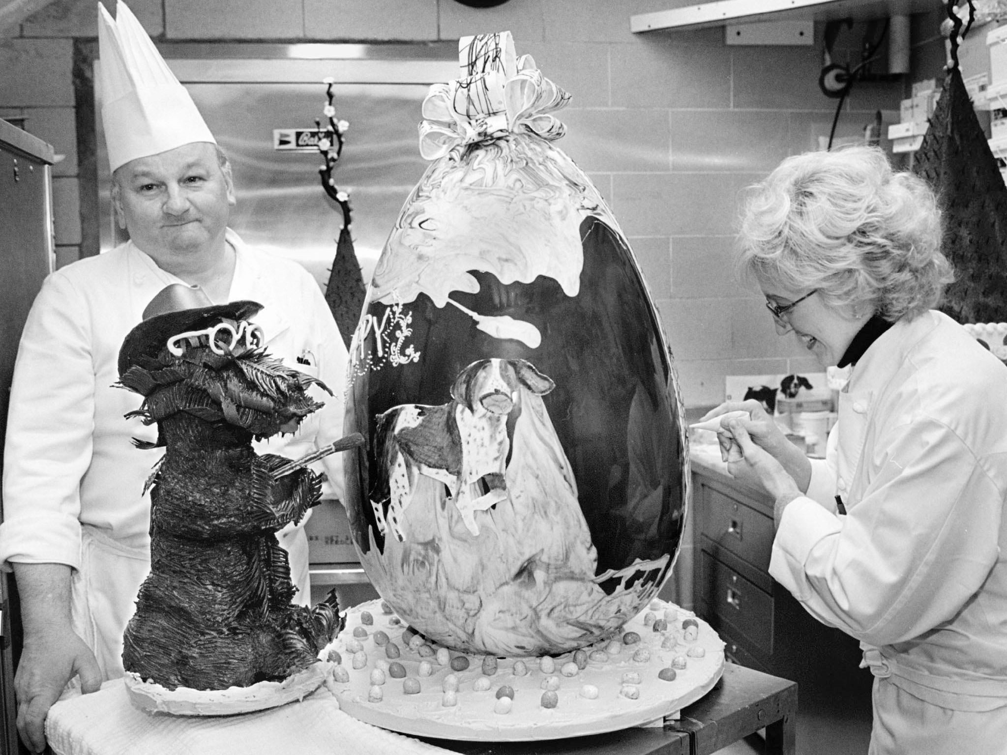 Mesnier and assistant Susie Morrison put the finishing touches on a 40lb chocolate Easter egg and a chocolate reproduction of George W Bush’s dog Barney in 2002