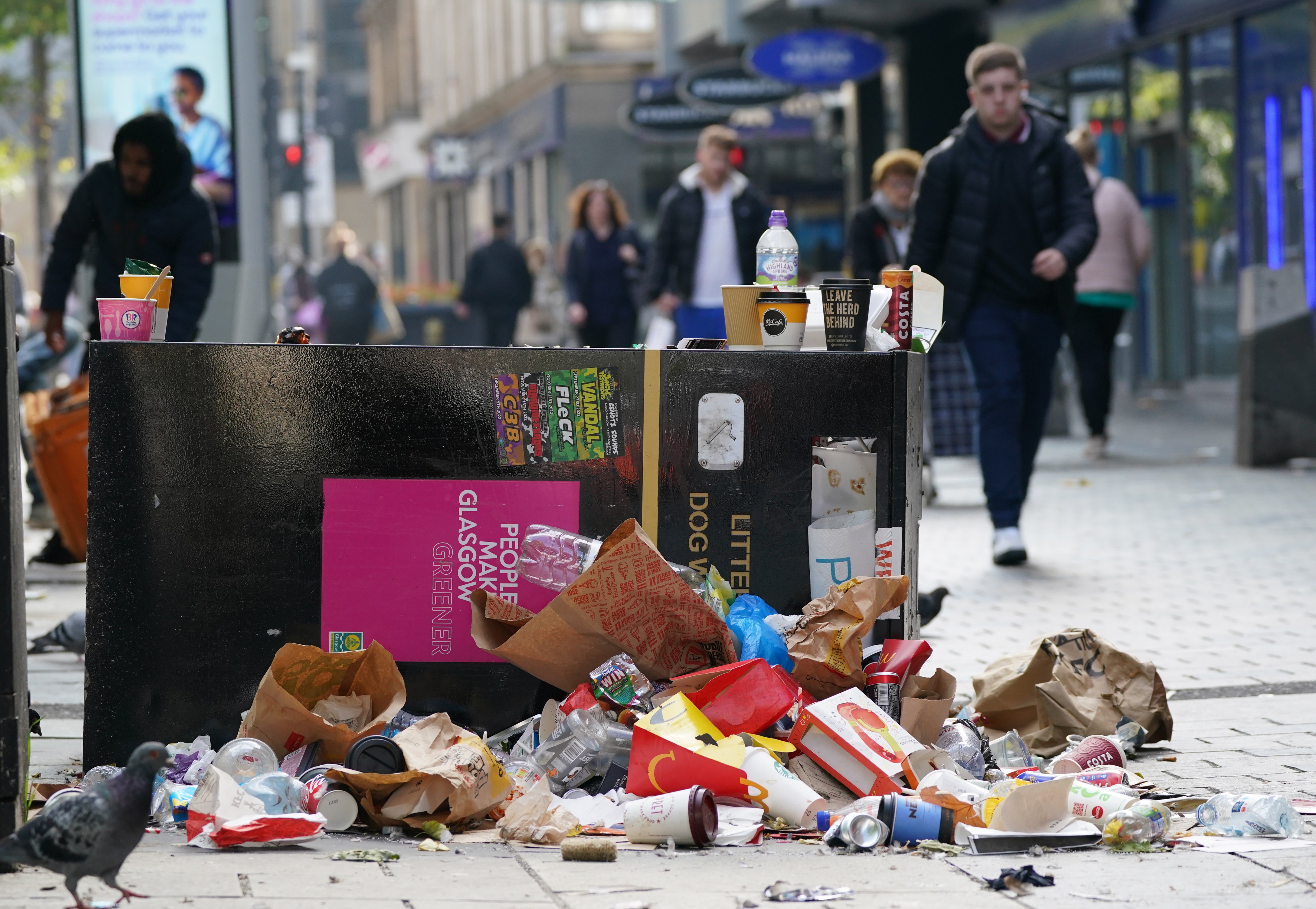 The dispute saw heaps of rubbish pile up in the streets (Andrew Milligan/PA)