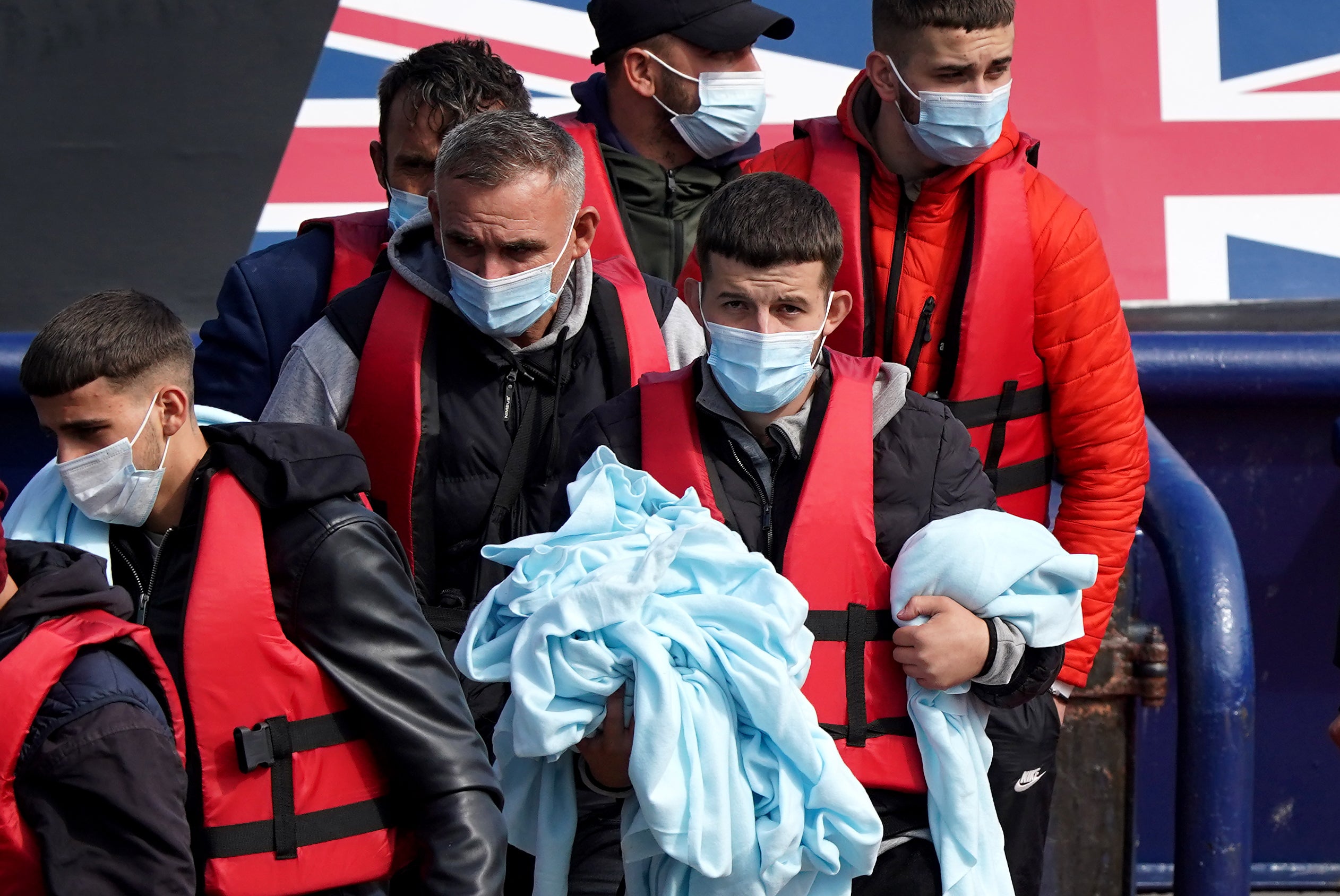 A group of people thought to be migrants are brought in to Dover, Kent, from a Border Force vessel following a small boat incident in the Channel. Picture date: Friday September 2, 2022 (Gareth Fuller/PA)