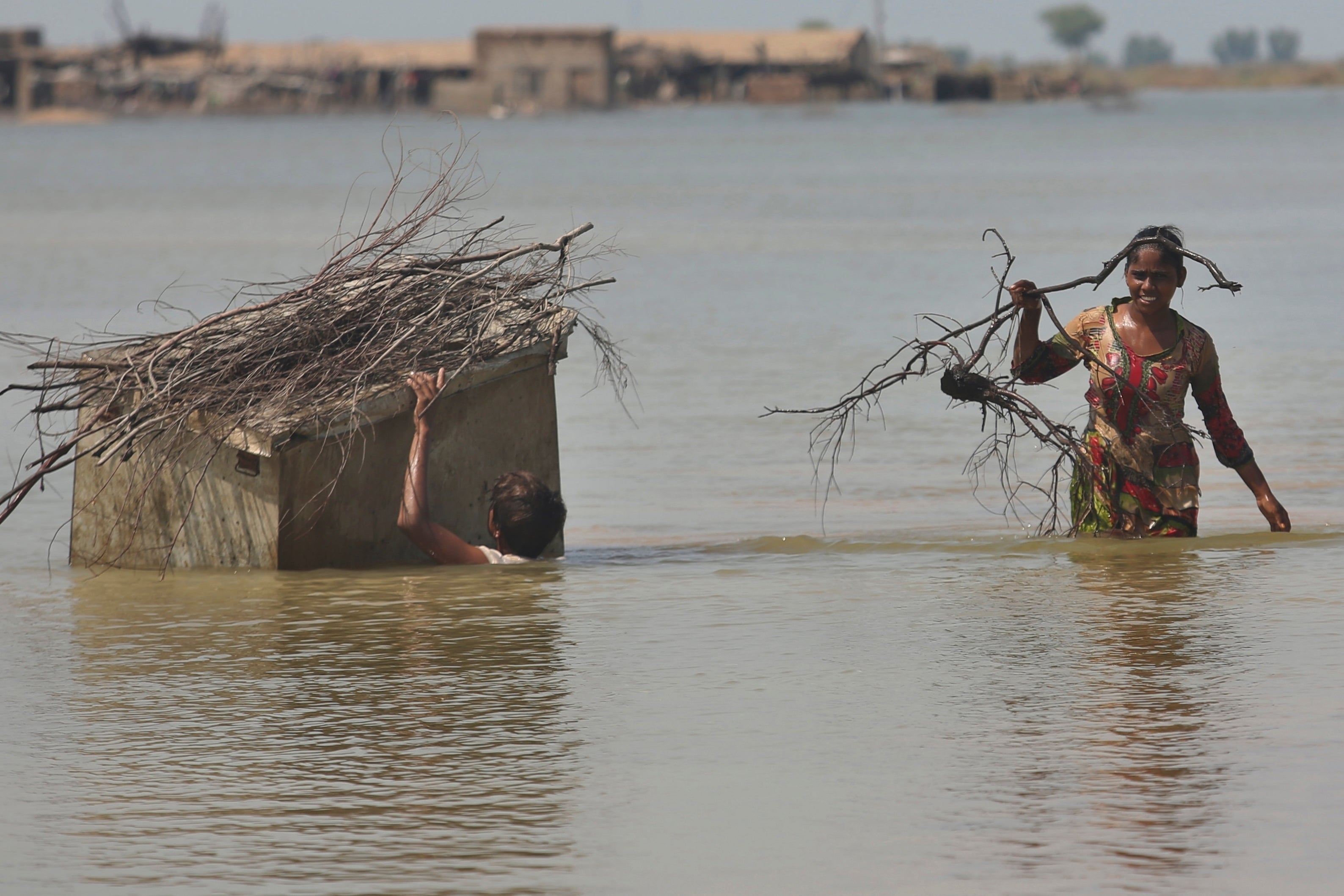 Officials hope the cut in the sides of Lake Manchar will protect about half a million people