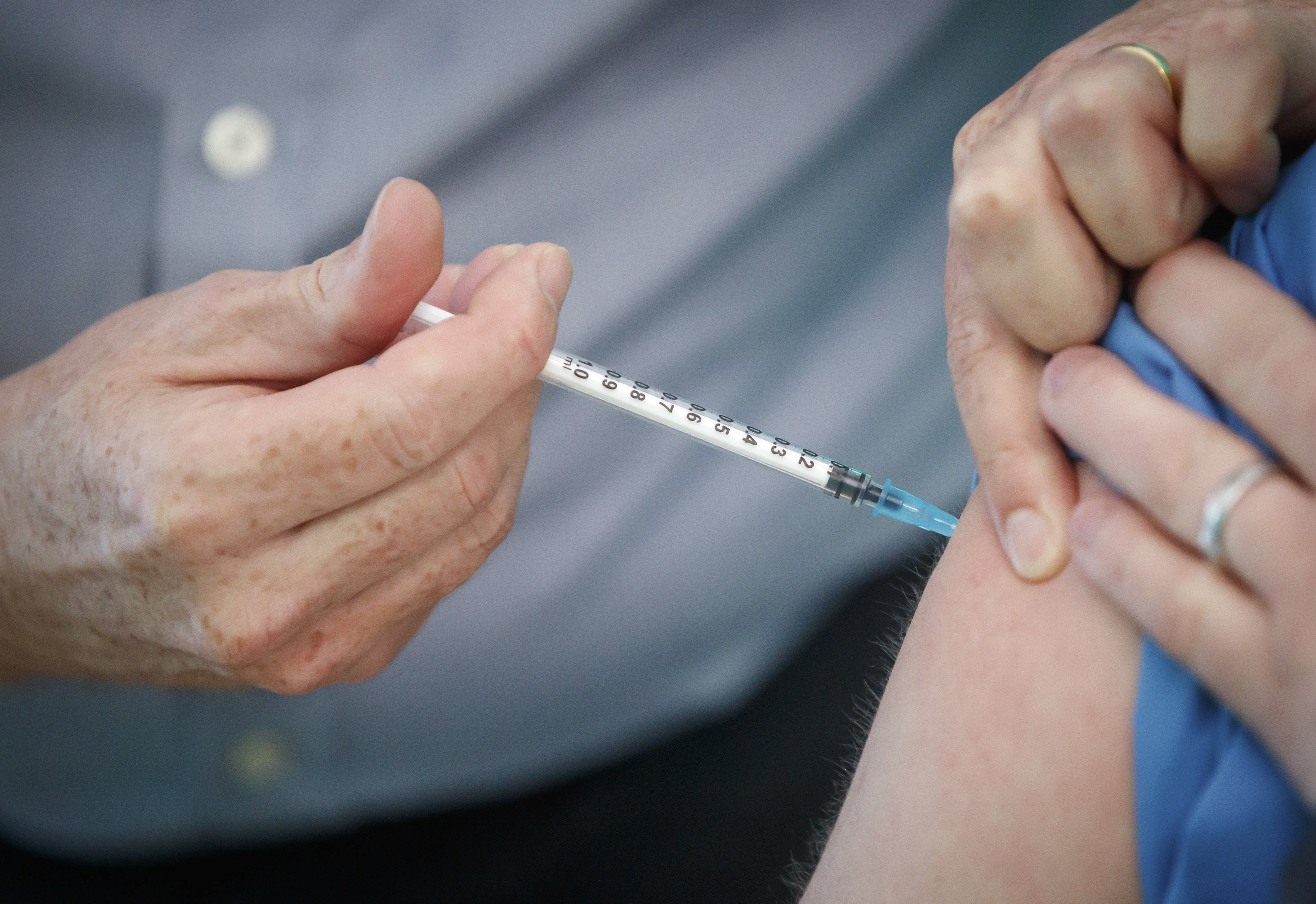 A Pfizer/BioNTech vaccine being administered (PA)