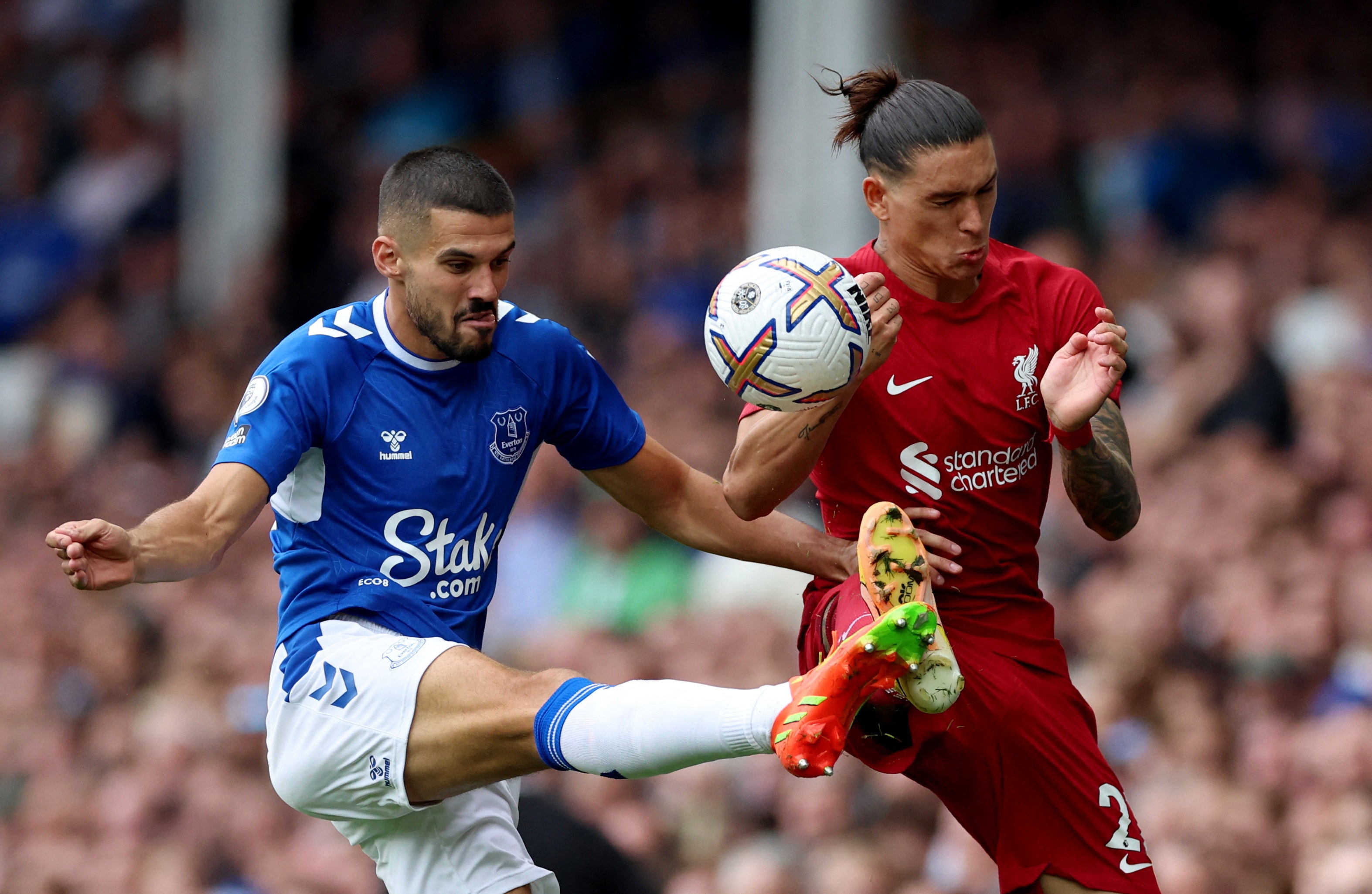 Everton's Conor Coady in action with Liverpool’s Darwin Nunez