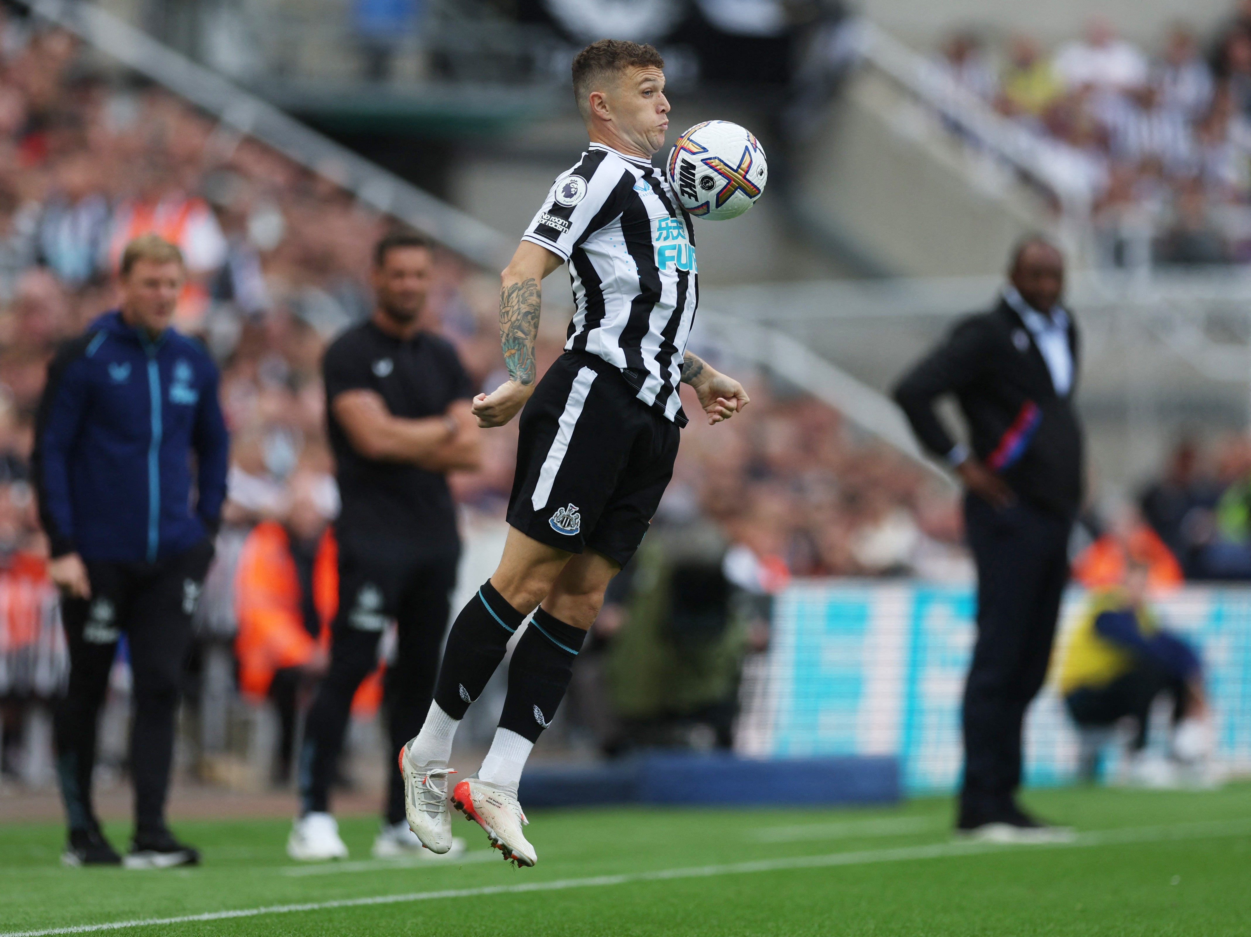 Kieran Trippier controls the ball with his chest