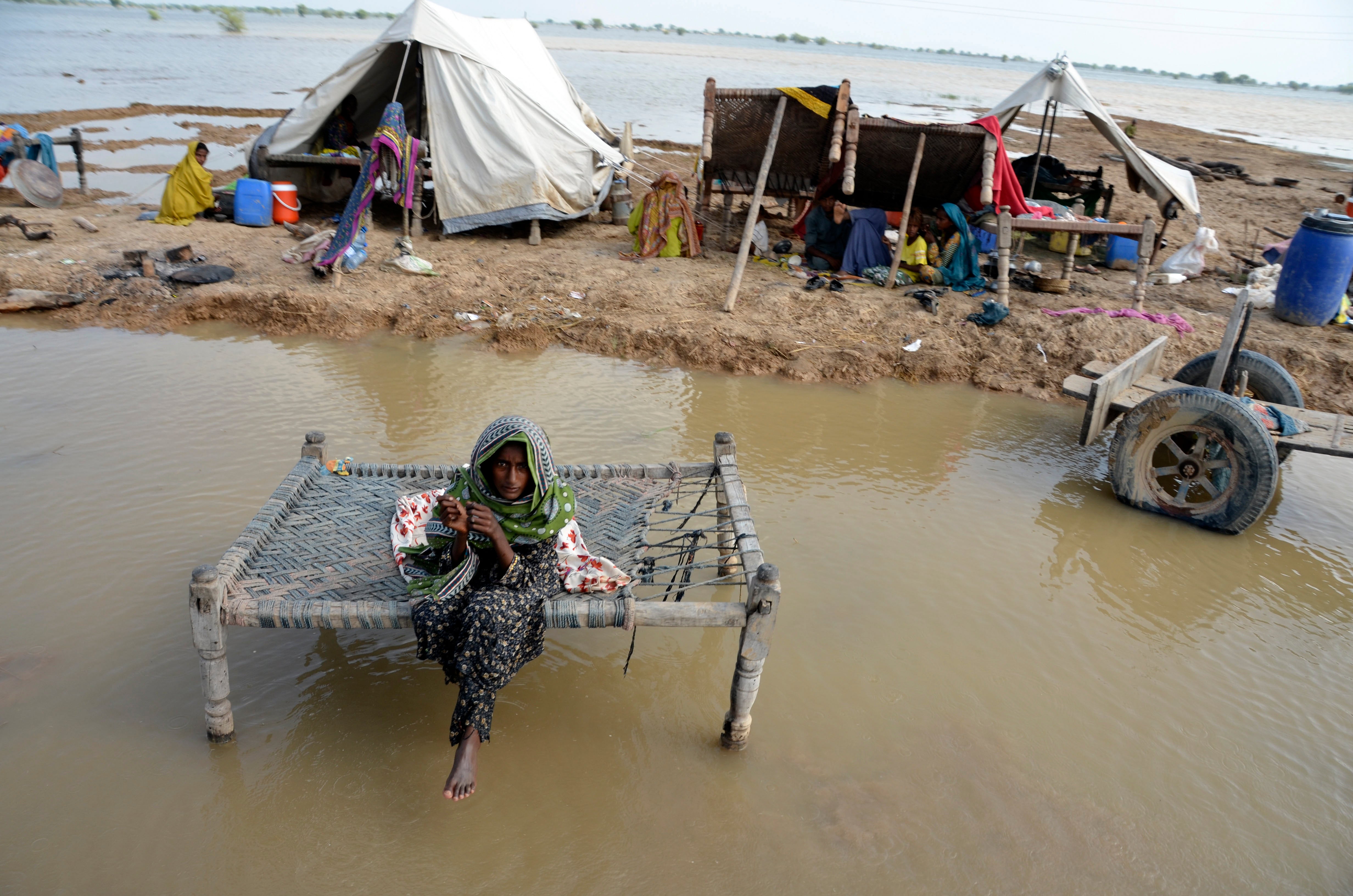 More than 1,300 people have died and millions have lost their homes in flooding