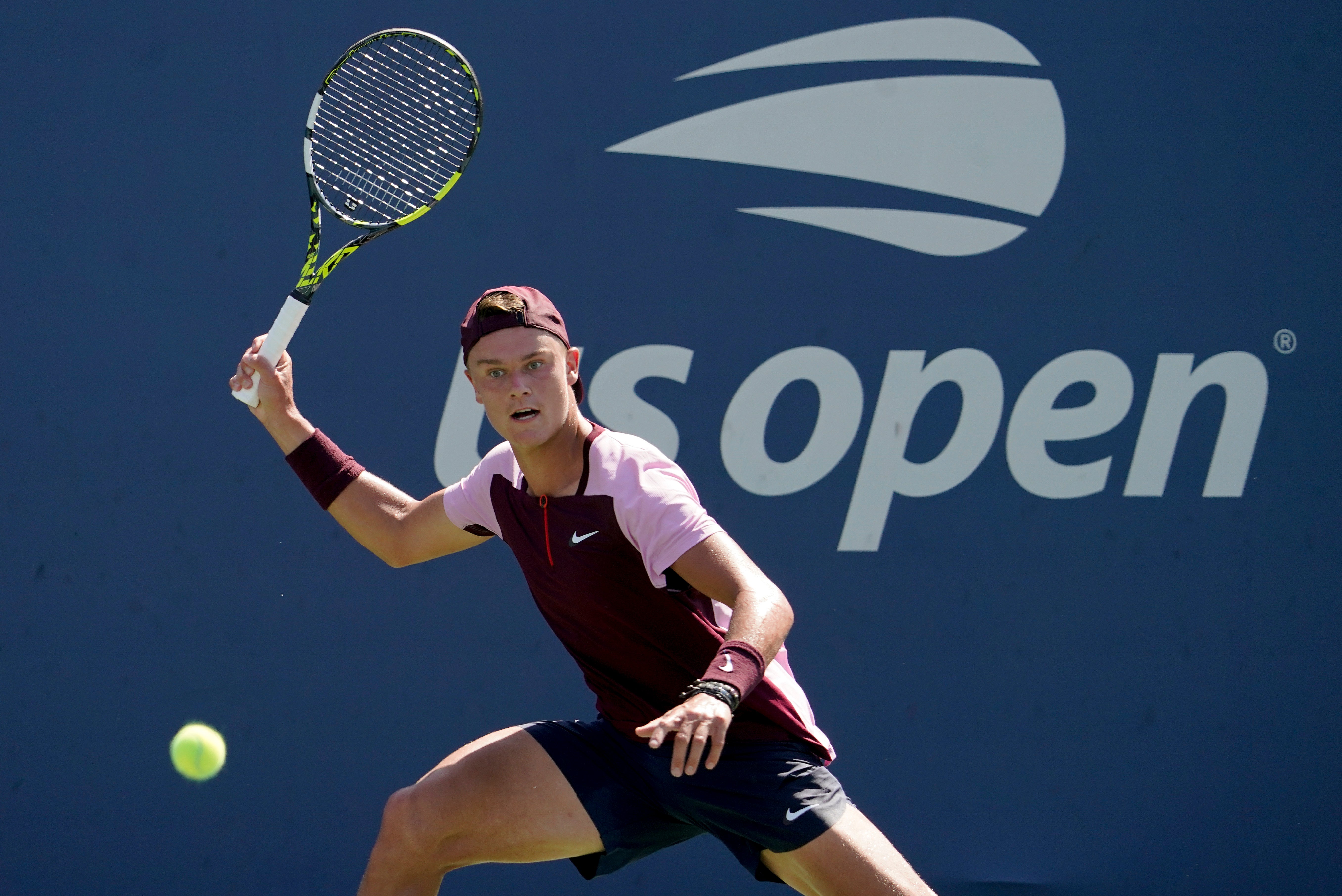 Holger Rune was not happy with Cameron Norrie catching the ball (AP Photo/Mary Altaffer)