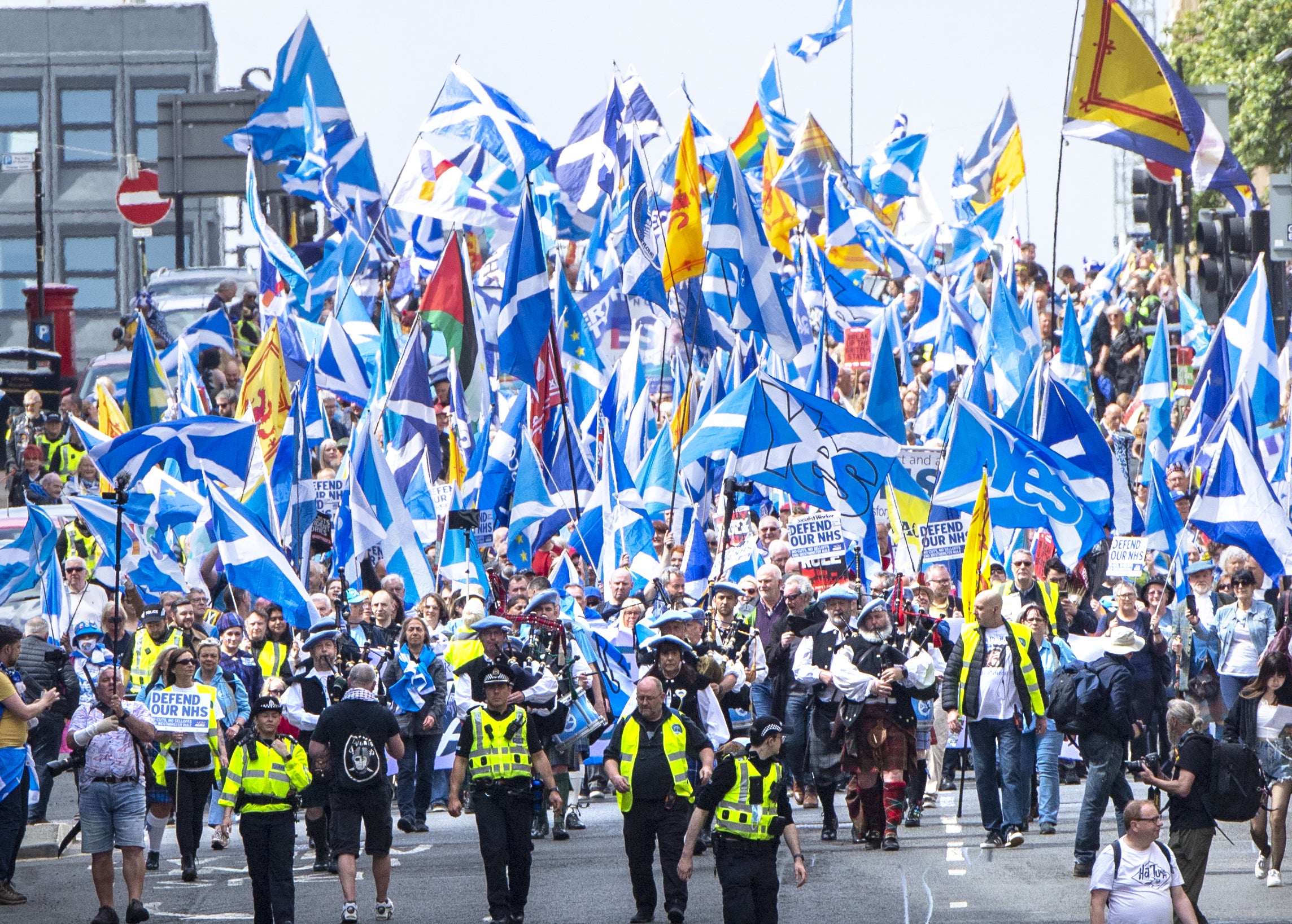 Scottish independence supporters march through Glasgow (Lesley Martin/PA)