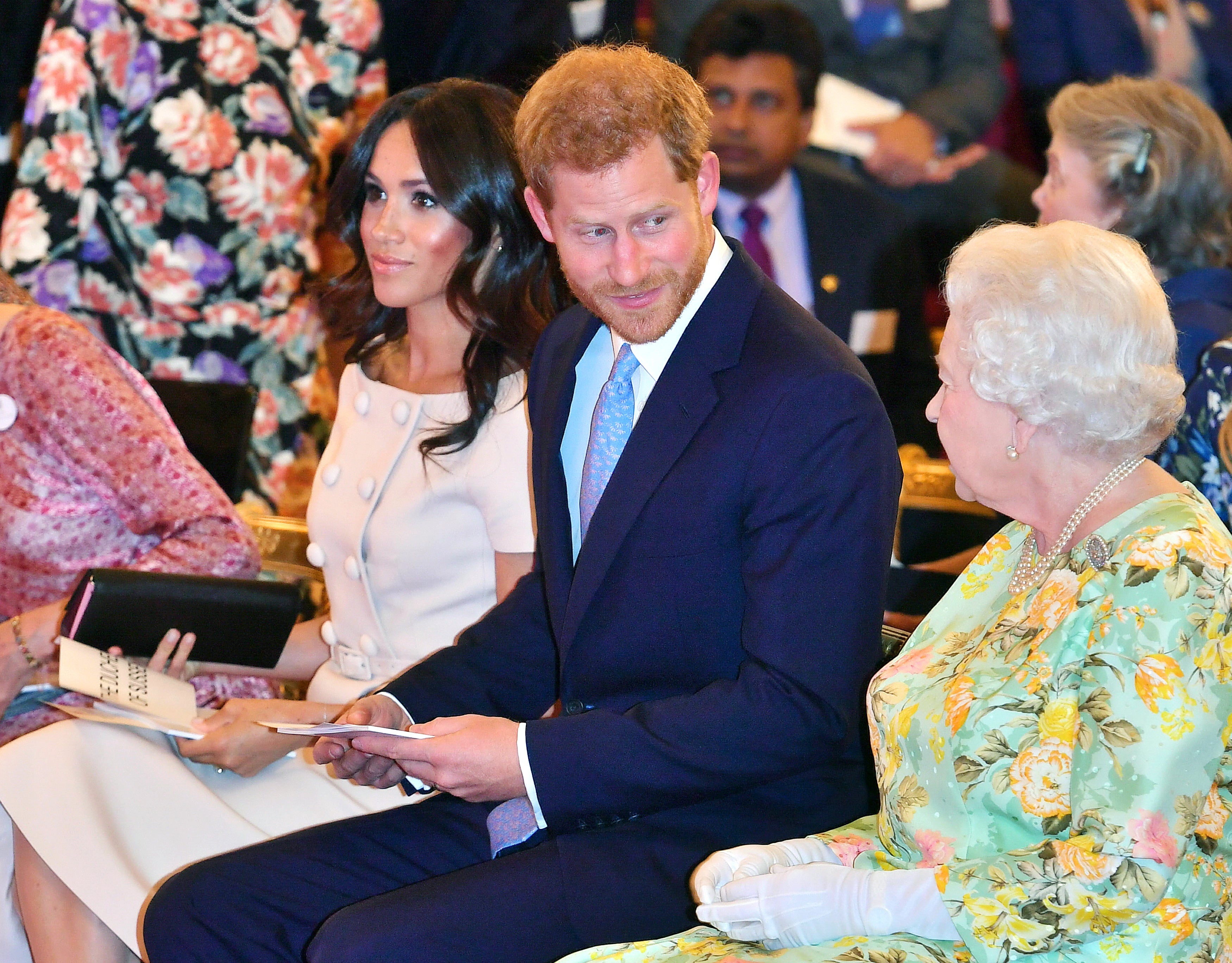 The Queen with the Duke and Duchess of Sussex at the Queen’s Young Leaders Awards Ceremony at Buckingham Palace (John Stillwell/PA)