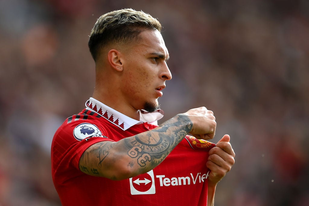 A badge-kissing celebration in front of the Arsenal fans may have been designed to endear the Brazilian to the United support