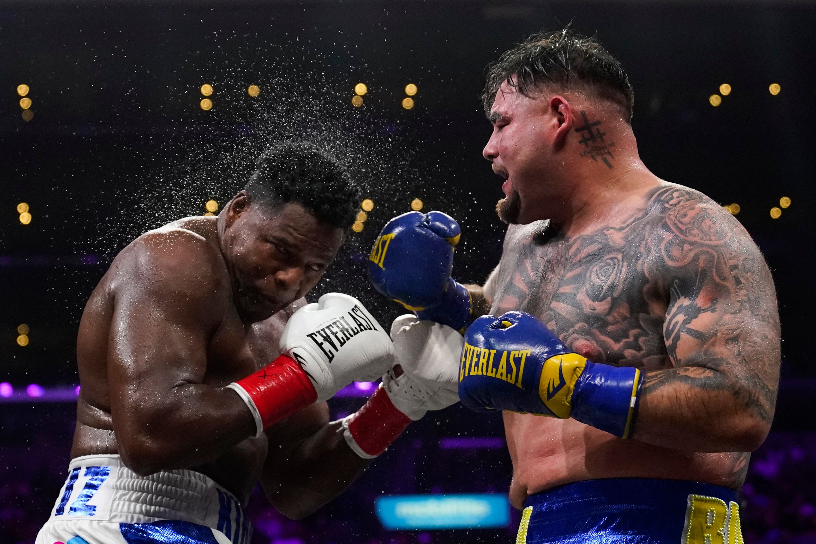 Ruiz Jr (right) dropped Ortiz twice but could not put the 43-year-old away