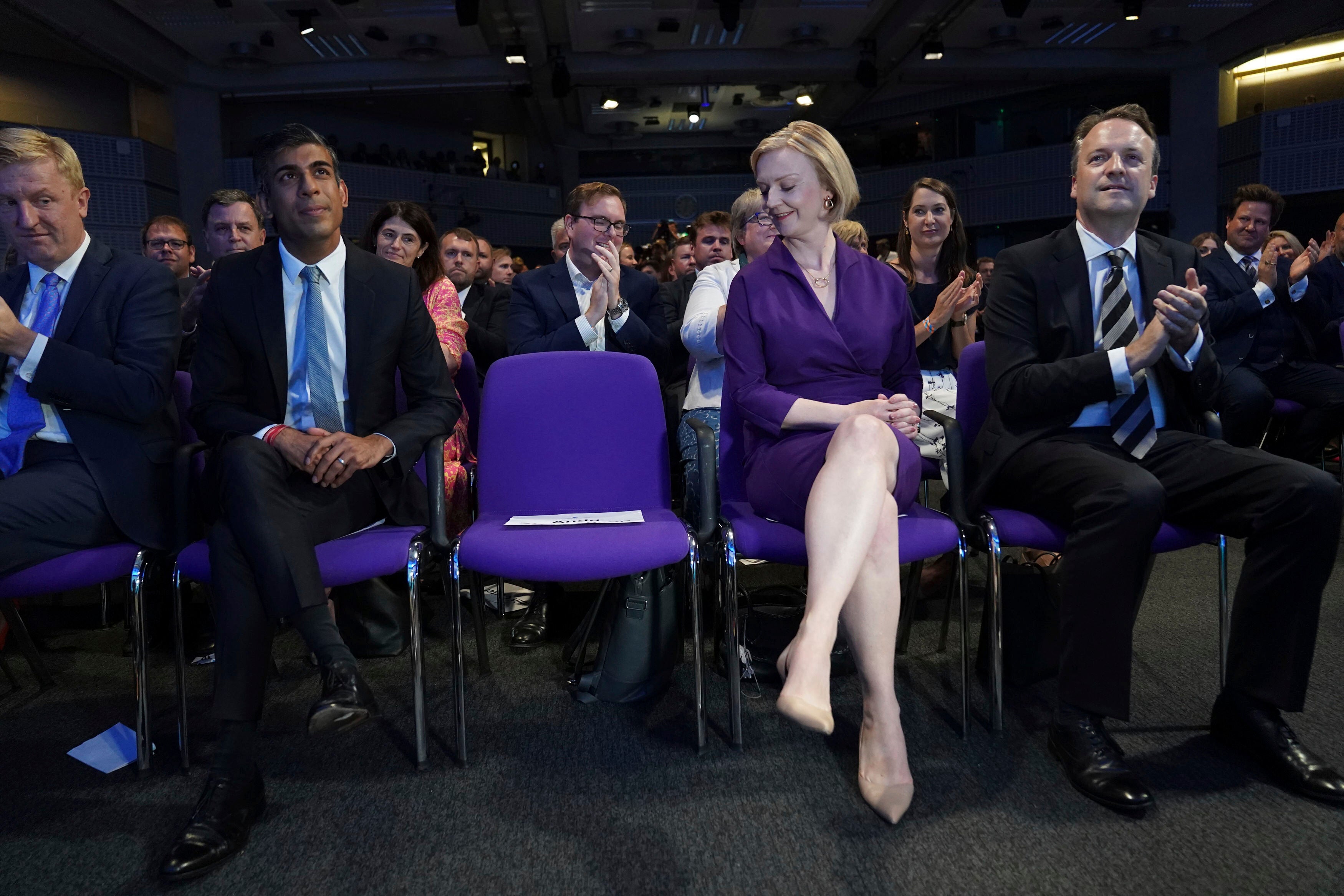 Rishi Sunak and Liz Truss wait to hear the result of the Tory leadership contest