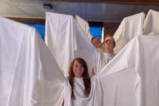 ‘Angels’ protect LGBT+ students from armed protesters at drag show event at Utah’s Brigham Young University