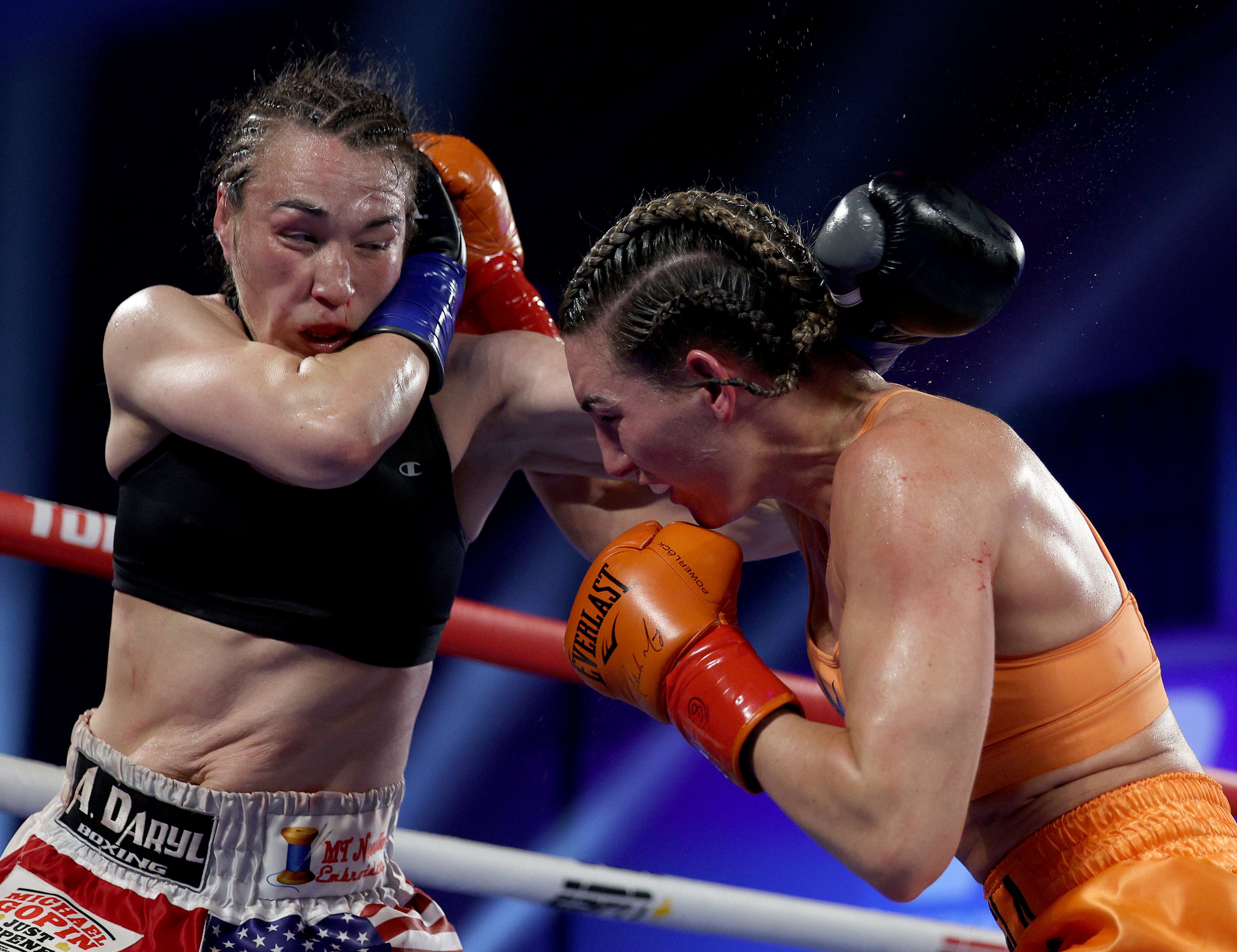 Mikaela Mayer teeing off on Jennifer Han during a decision win this April