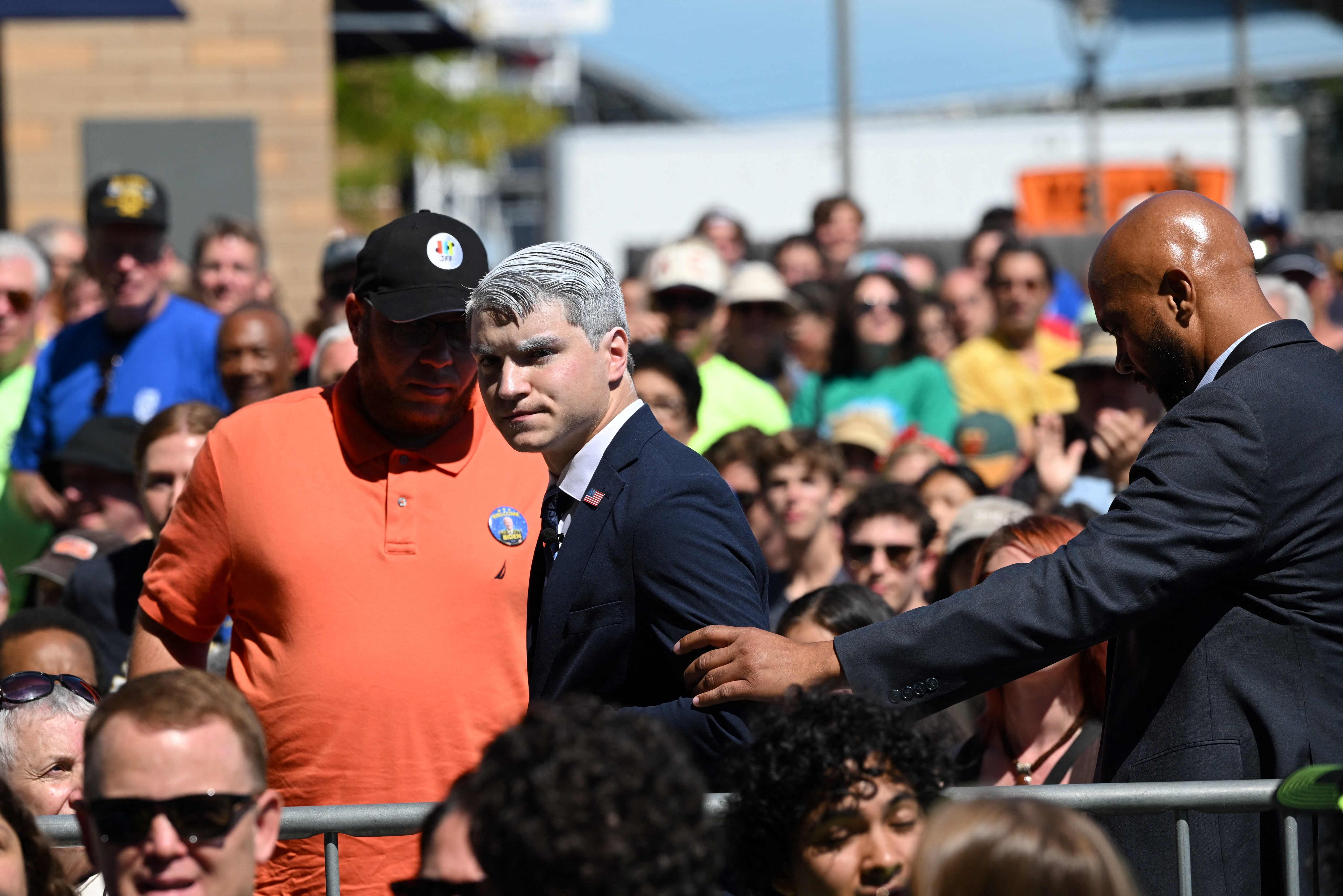 A man who heckled US President Joe Biden as he spoke is removed