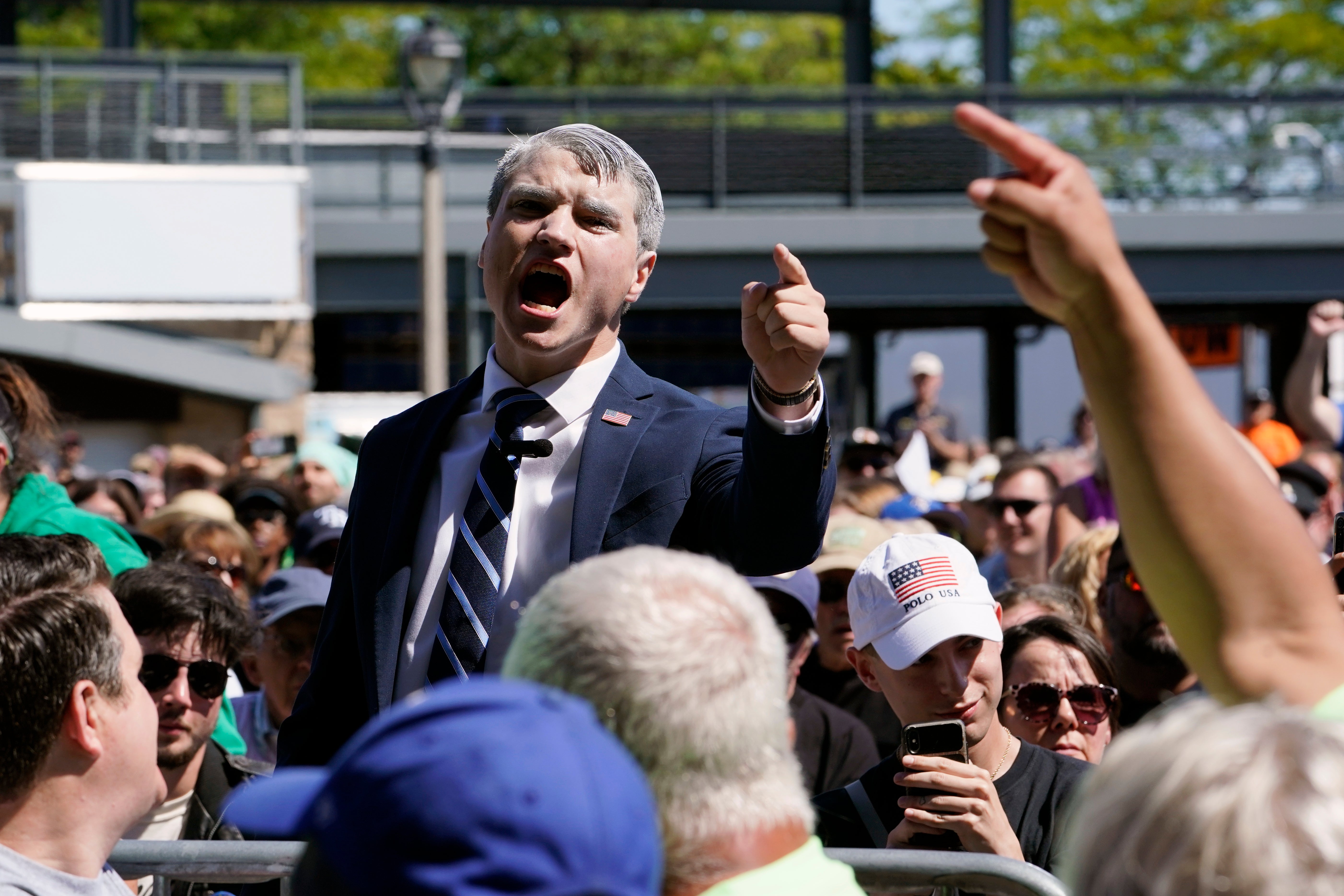 A heckler in the crowd as President Joe Biden speaks during an event at Henry Maier Festival Park in Milwaukee, 5 September 2022