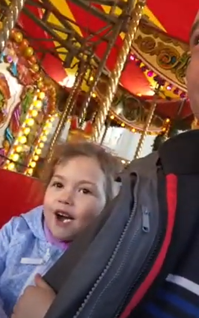 Olivia and her dad John Francis Pratt at a Christmas market