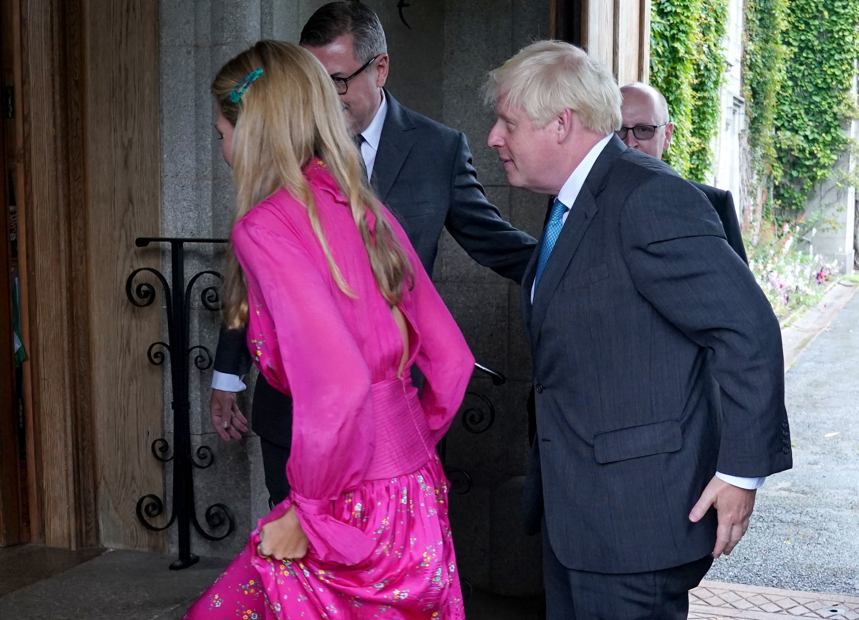 Boris Johnson and his wife Carrie Johnson are greeted at Balmoral (Andrew Milligan/PA)