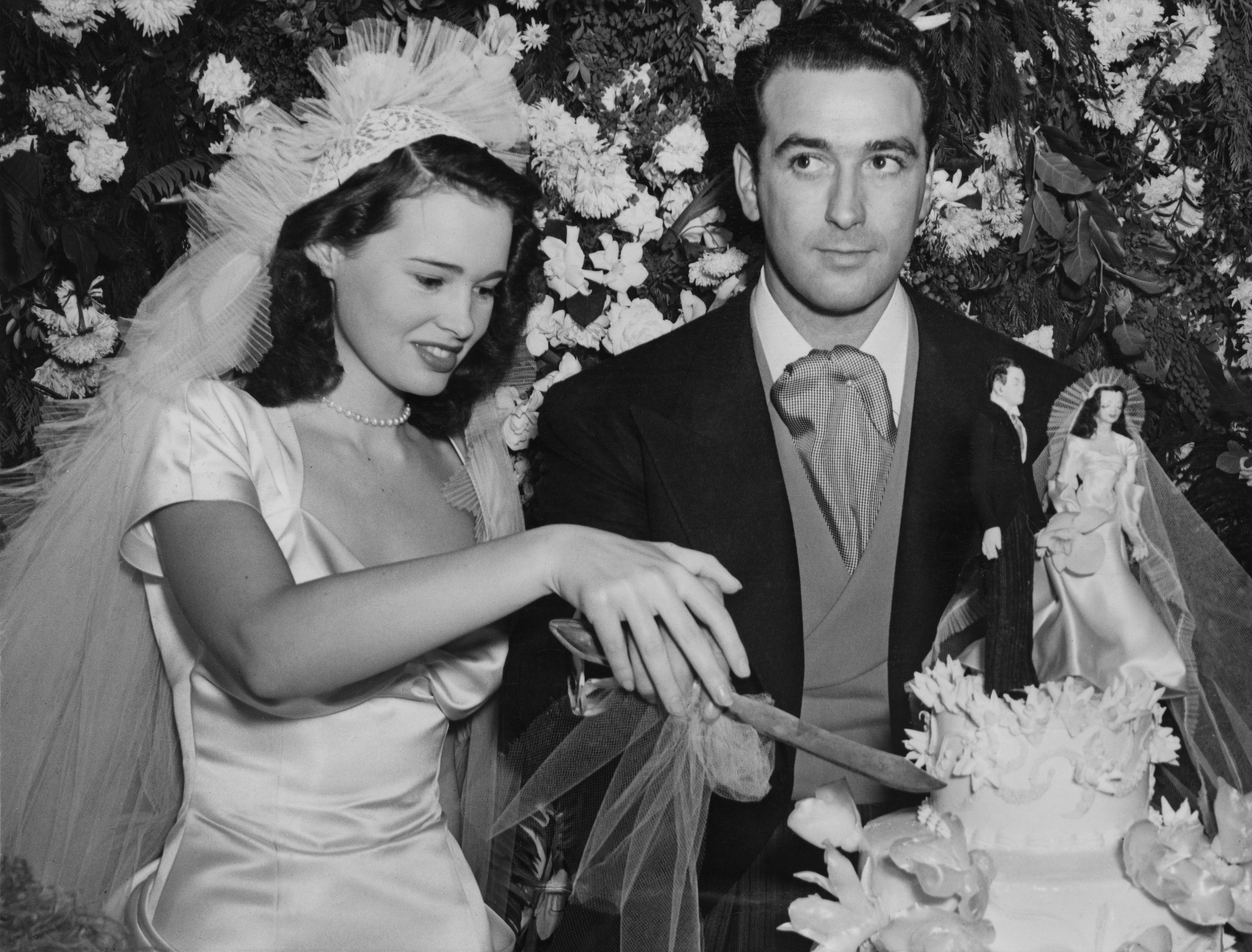 Gloria Vanderbilt with her first husband Pat DiCicco at their wedding reception in Beverly Hills, California, on 28 December 1941