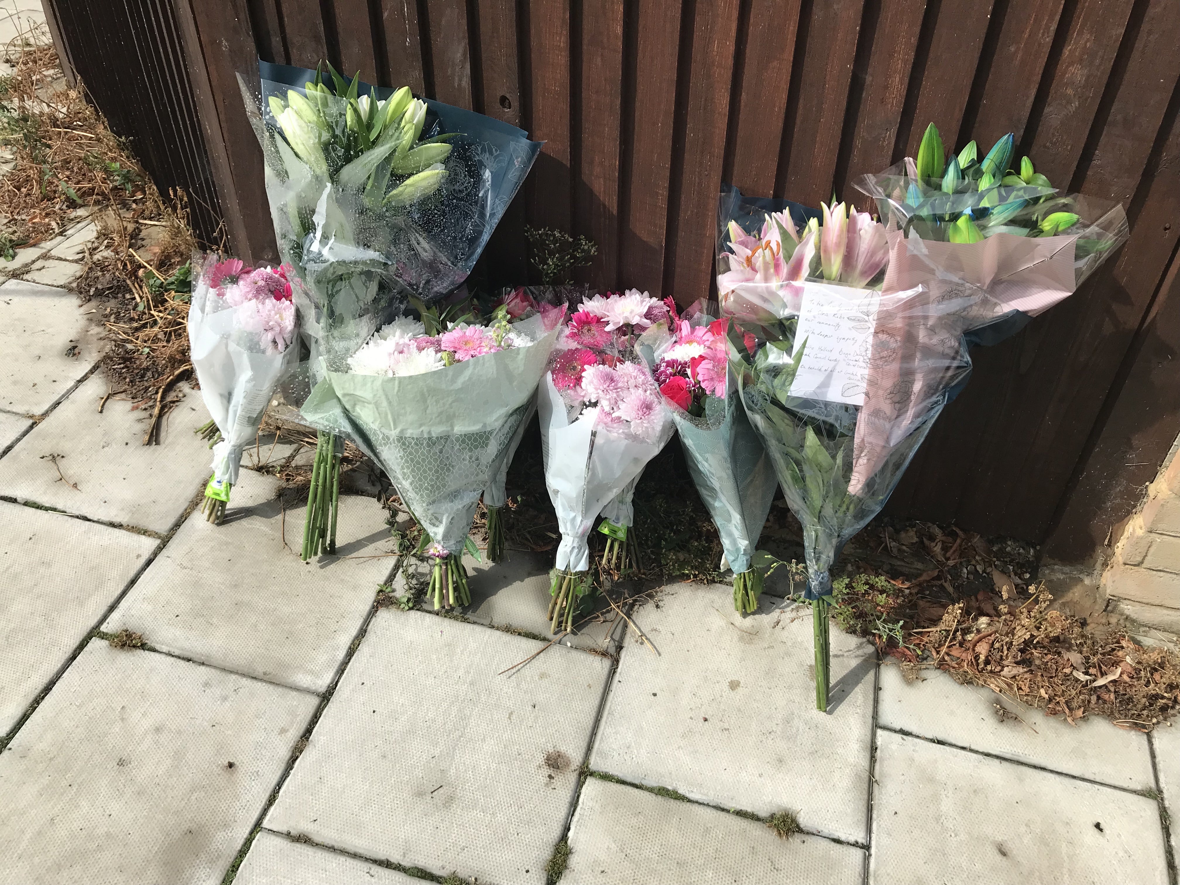 Floral tributes left at the scene (Andrew Quinn/PA)