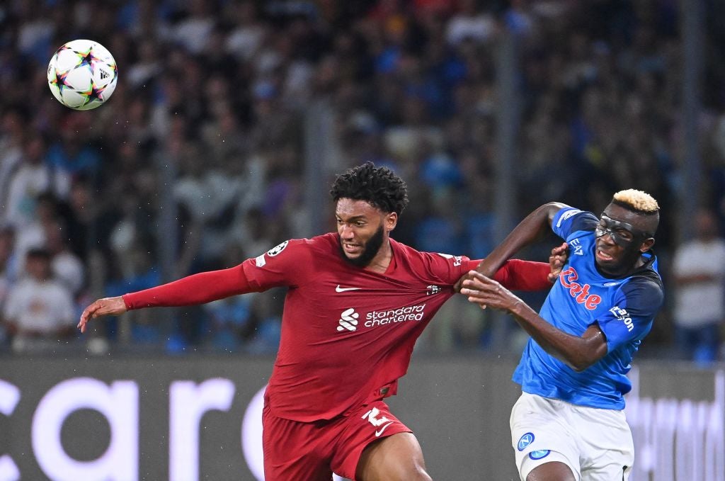 Joe Gomez fights for the ball with forward Victor Osimhen