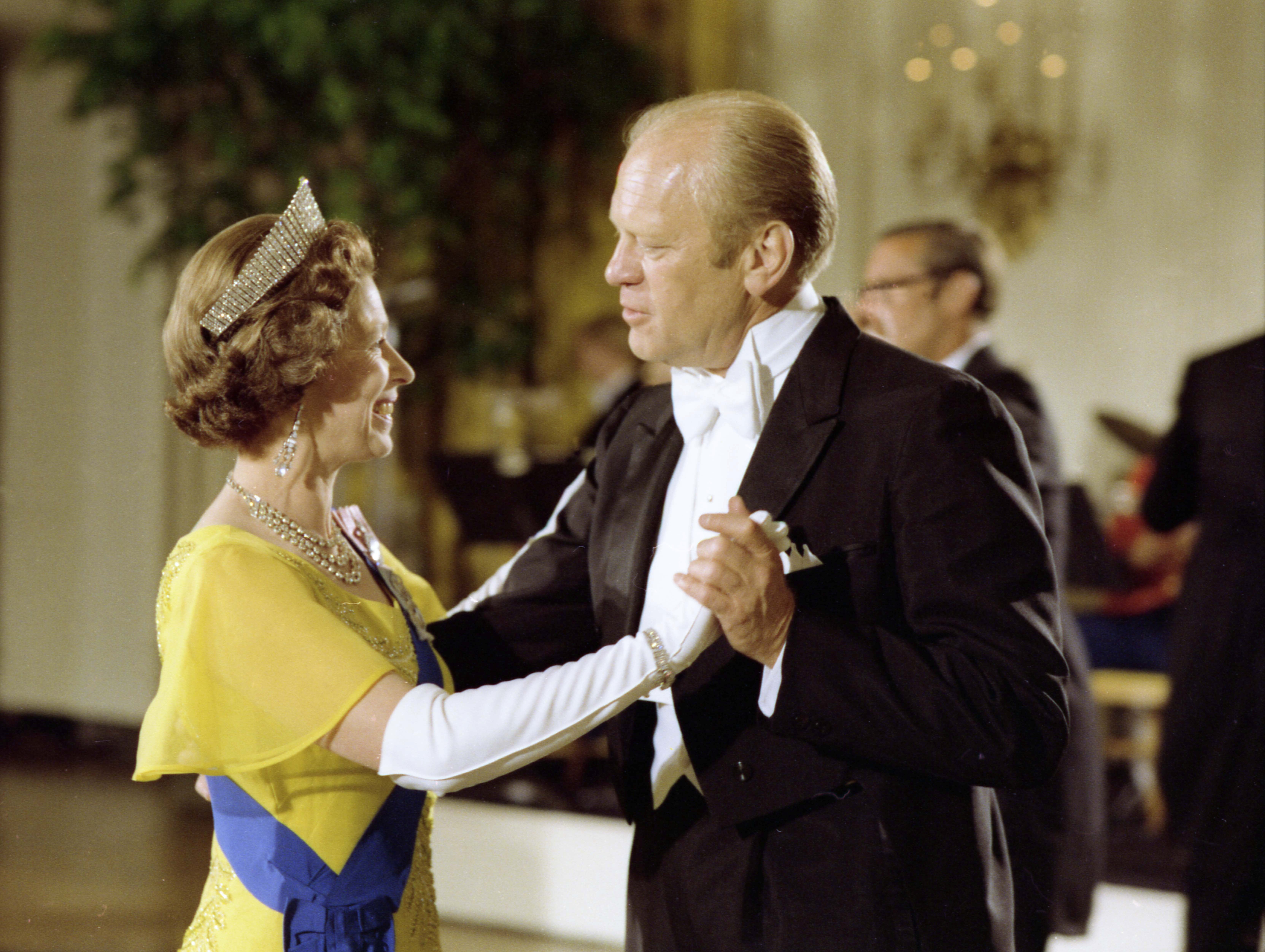 President Gerald Ford and Britain's Queen Elizabeth dance during a state dinner