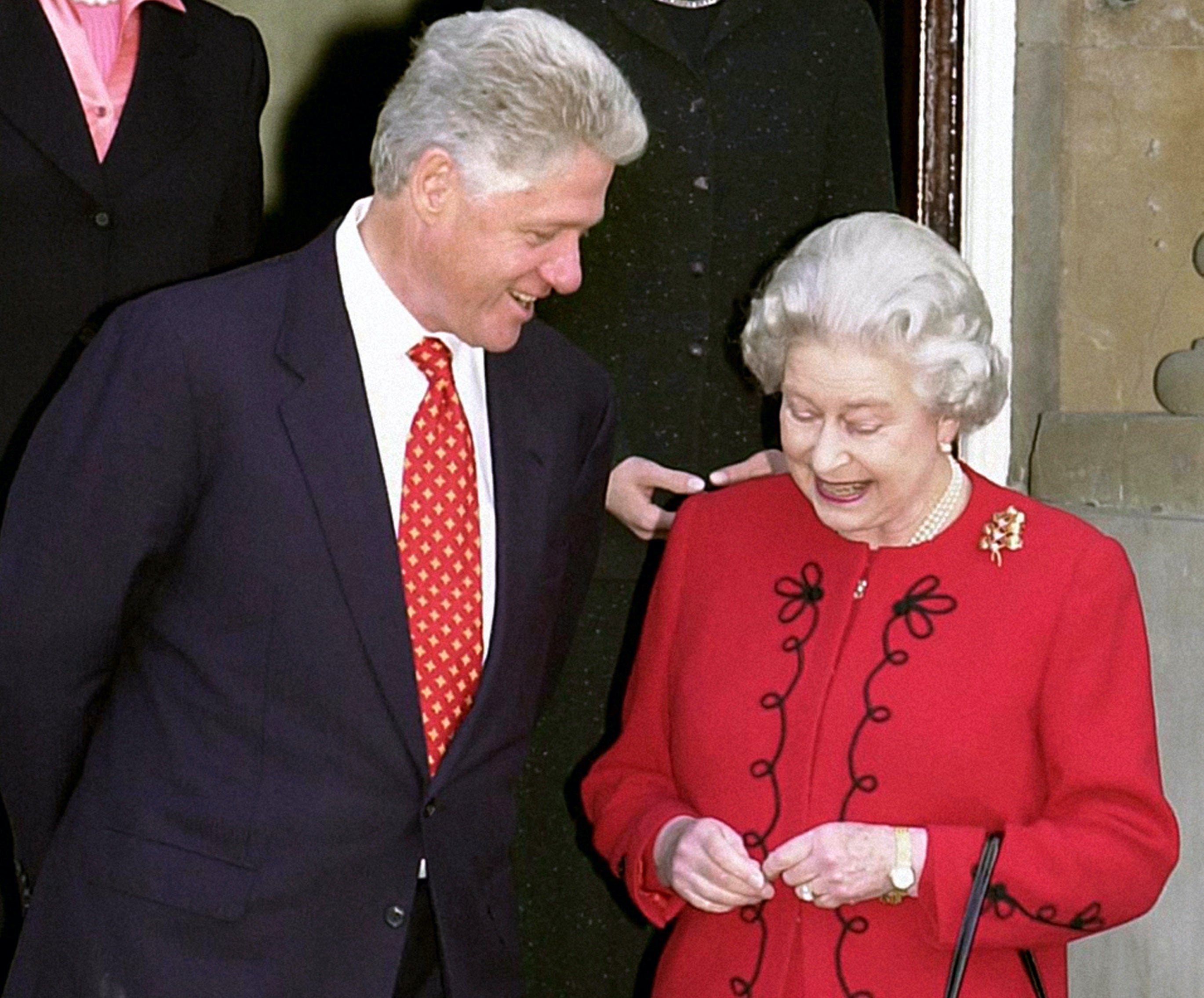 President Bill Clinton meets Britain's Queen Elizabeth II at Buckingham Palace