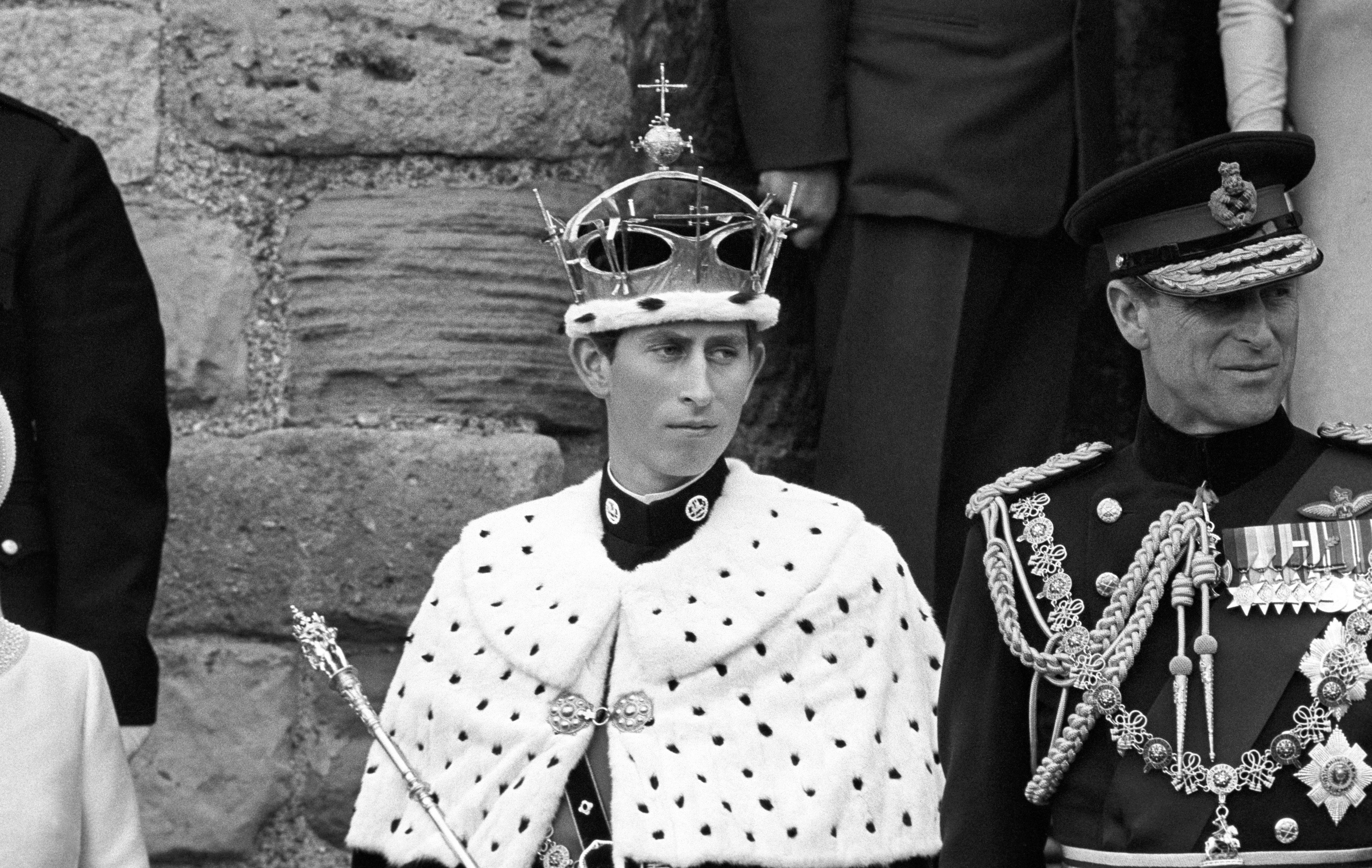 The Prince of Wales at his investiture at Caernarfon Castle, with the Duke of Edinburgh (PA)