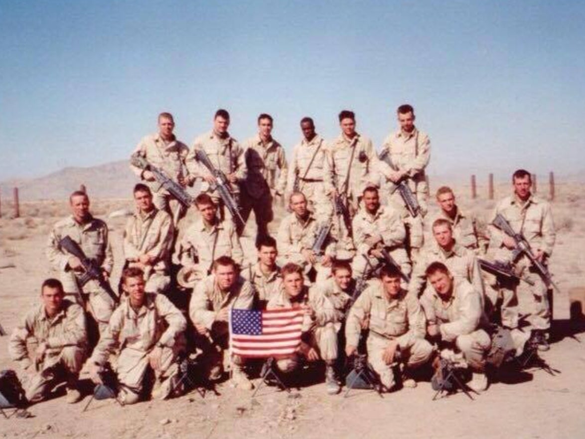 Sgt Bill Bee (front row, fourth from left) is seen with his platoon during the War on Terror