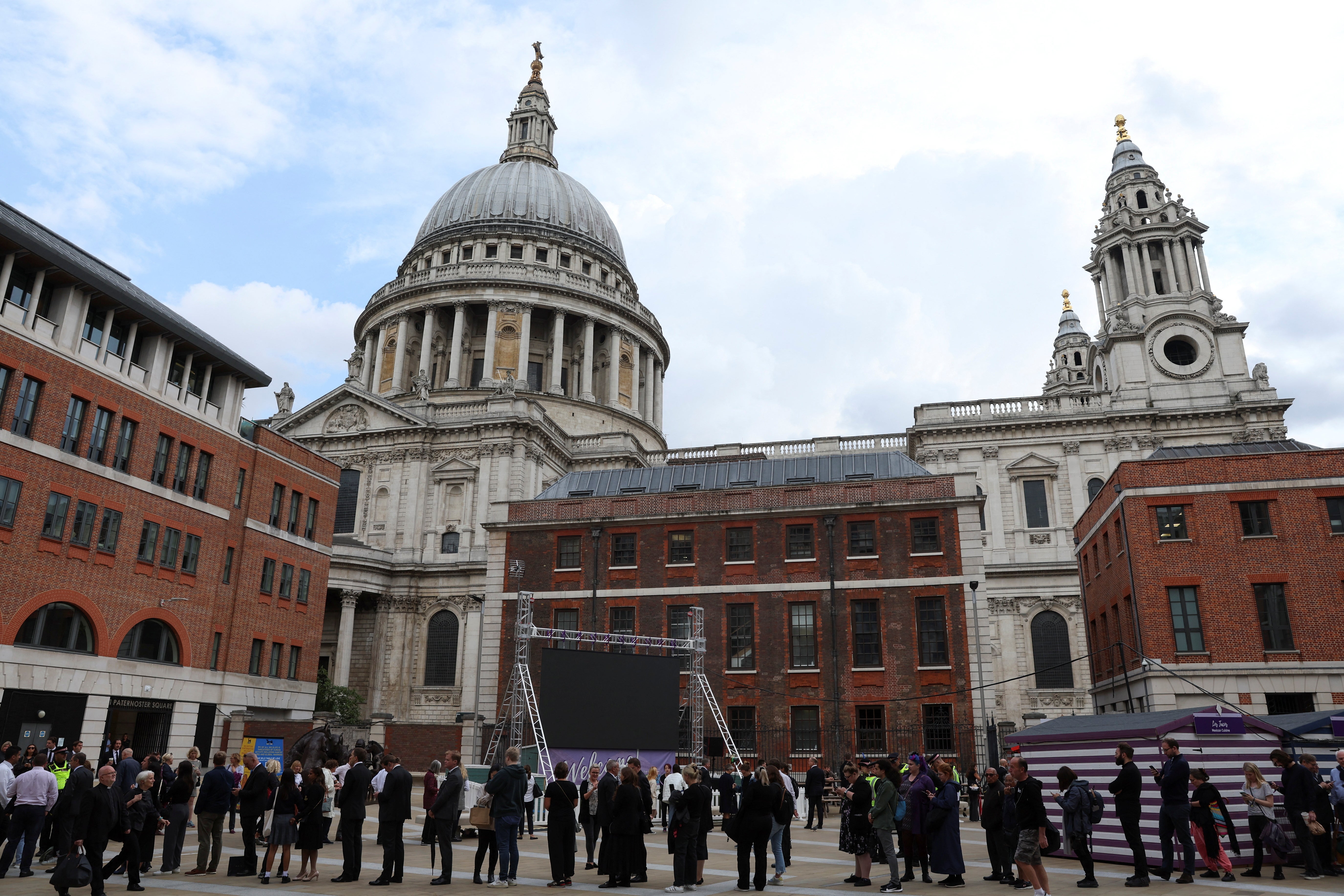 Members of the public queueing to get into the service today