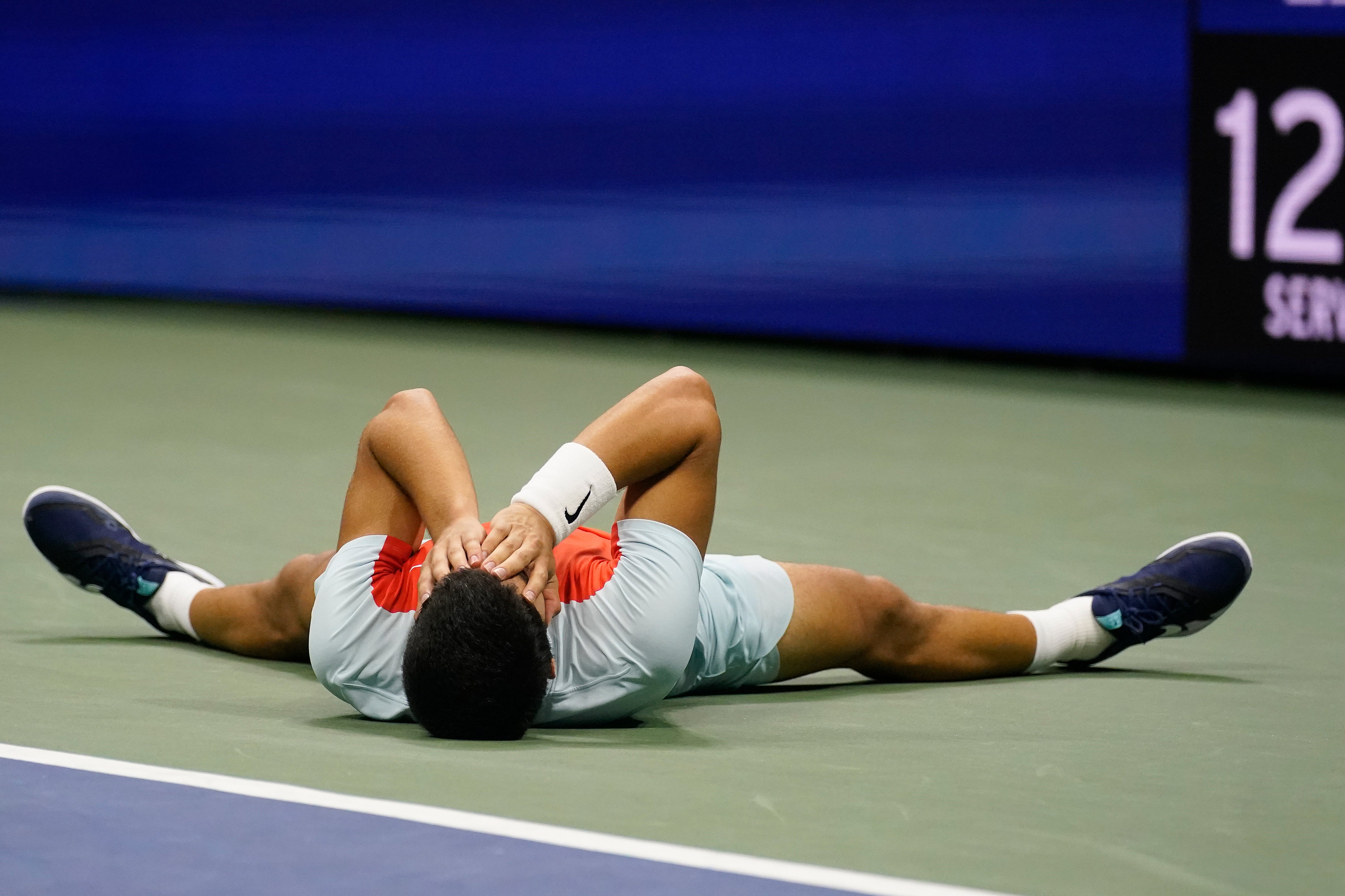 Carlos Alcaraz will take on Casper Ruud for the US Open title and the world number one ranking after beating Frances Tiafoe in another five-set classic to reach his first grand slam final (Charles Krupa/AP)