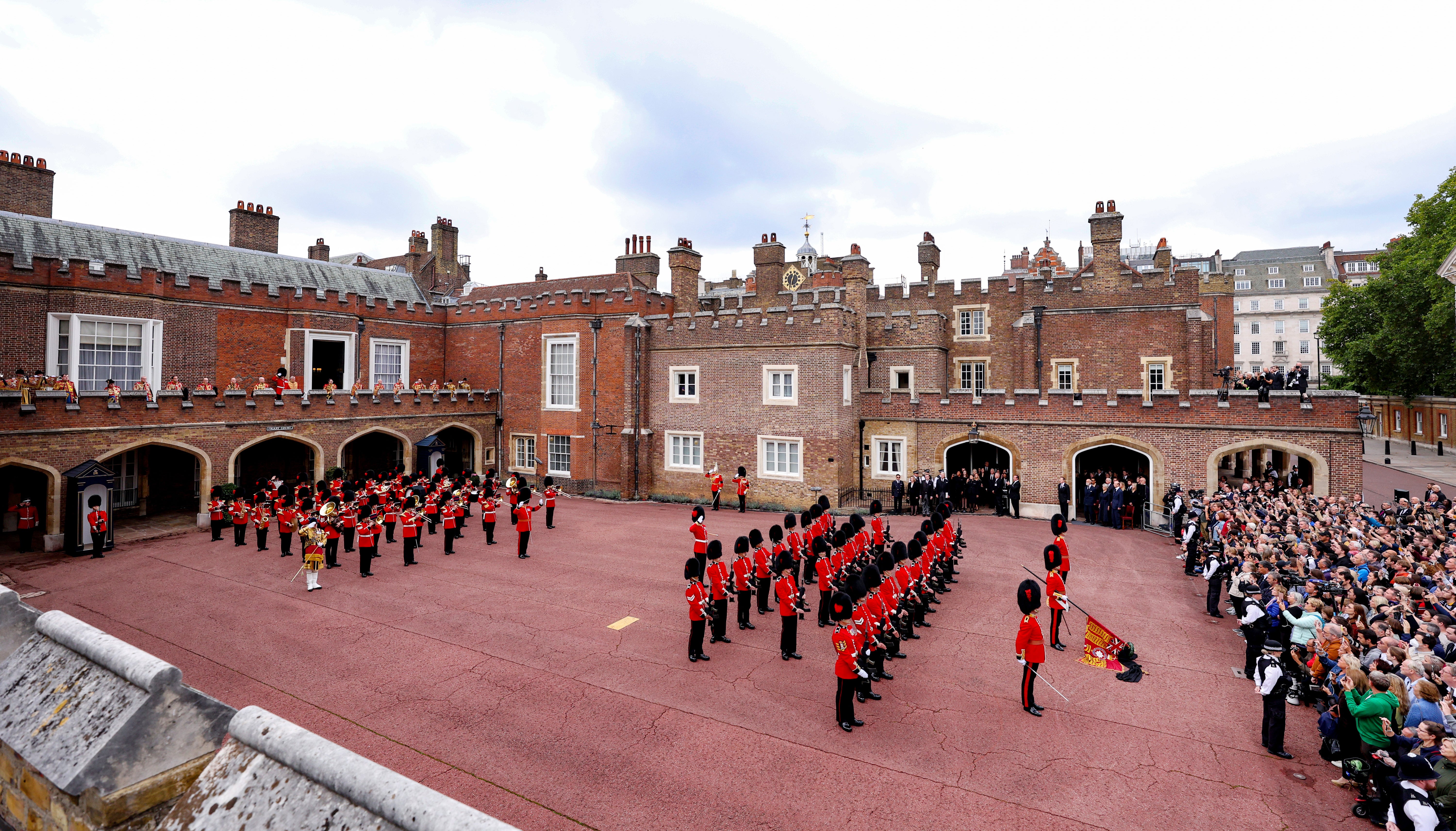 The garter principal king of arms, David Vines White, reads the proclamation of the new king, King Charles III, from the Friary Court balcony of St James’s Palace, London