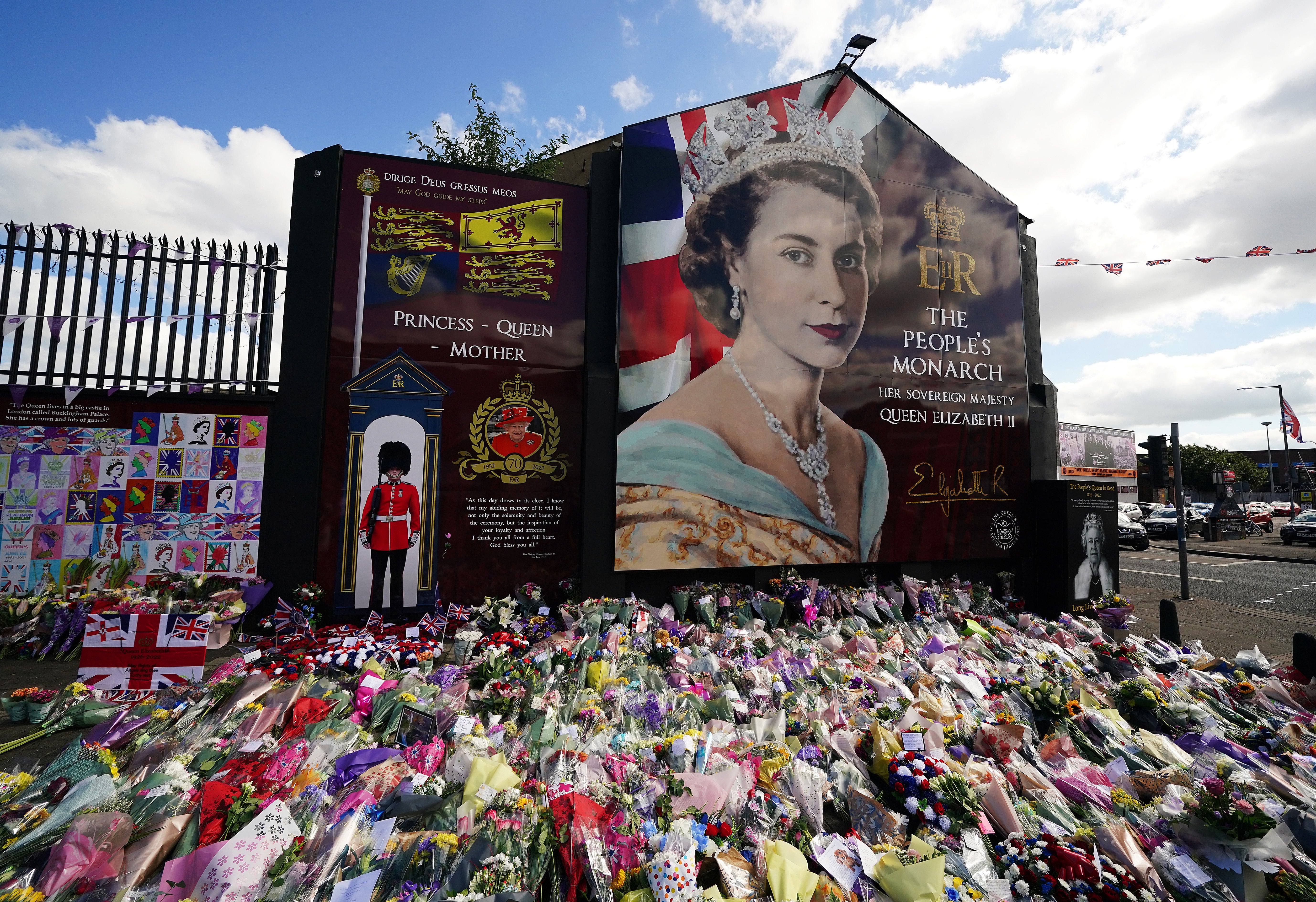 Flowers laid on Belfast’s Shankill Road following the death of Queen Elizabeth II on Thursday (Brian Lawless/PA)