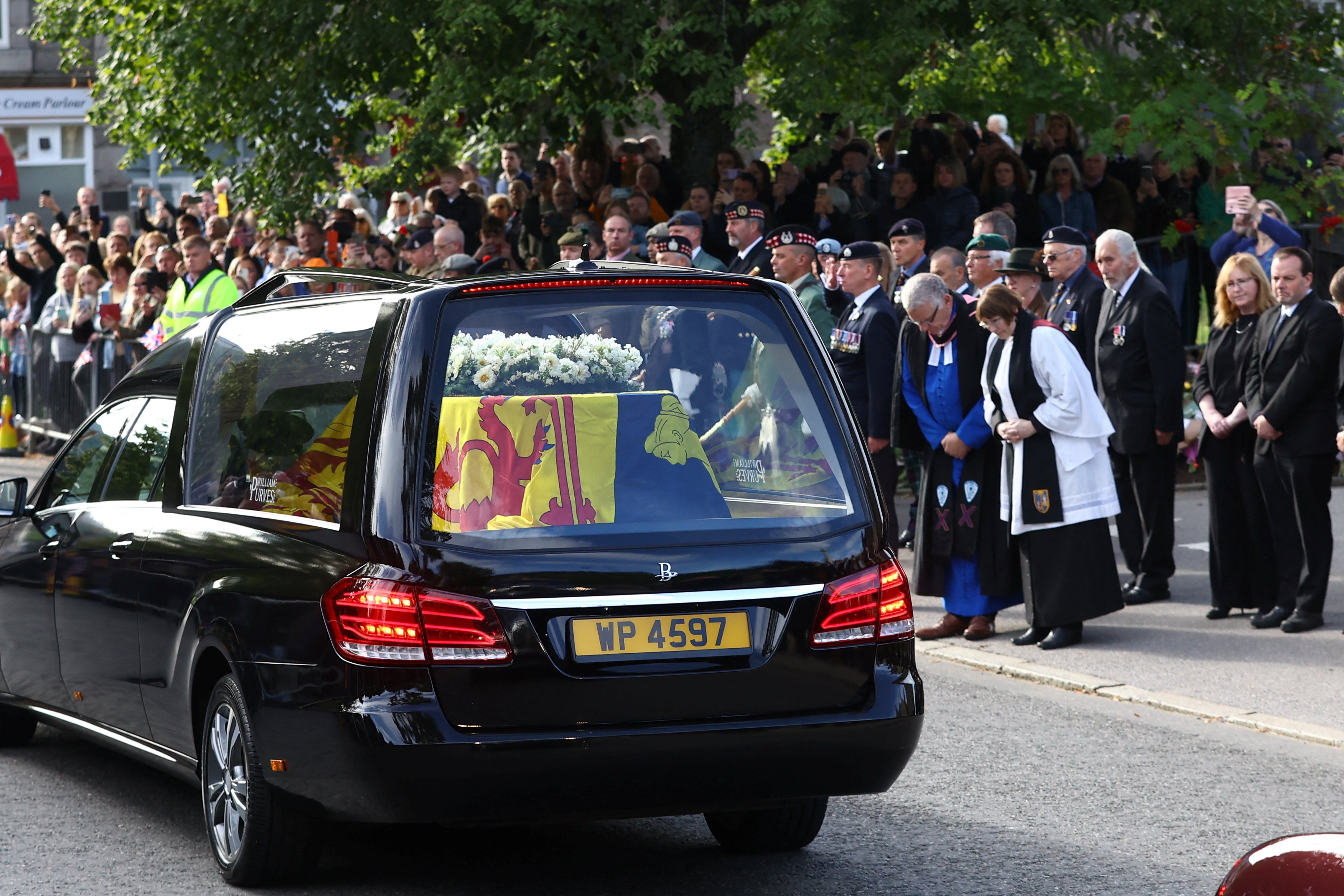 The public in Ballater fell into a hush as the Queen’s coffin drove down familiar streets