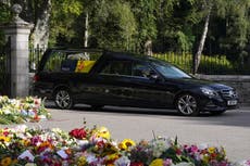 Thousands line streets as Queen’s coffin embarks on trip to final resting place